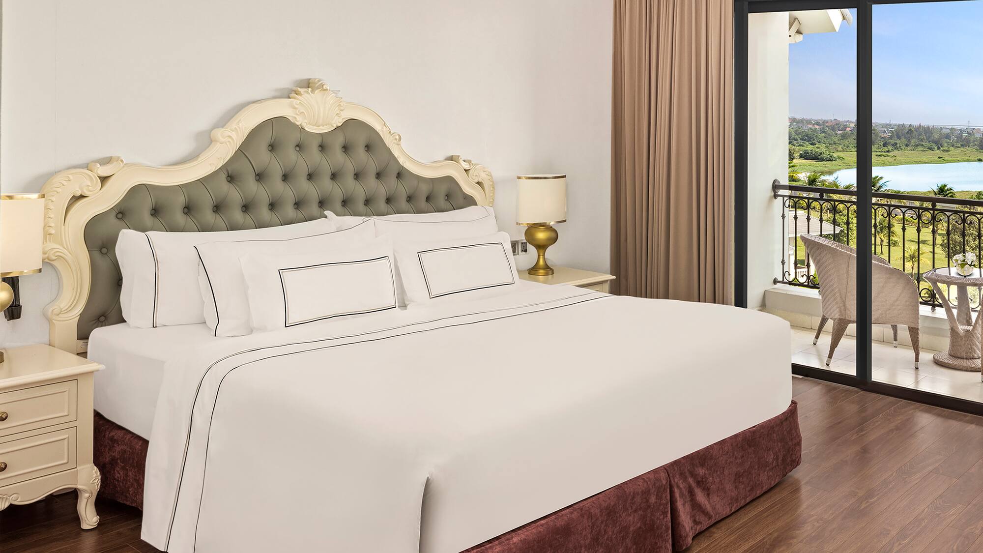 a bed with a glass door and a balcony