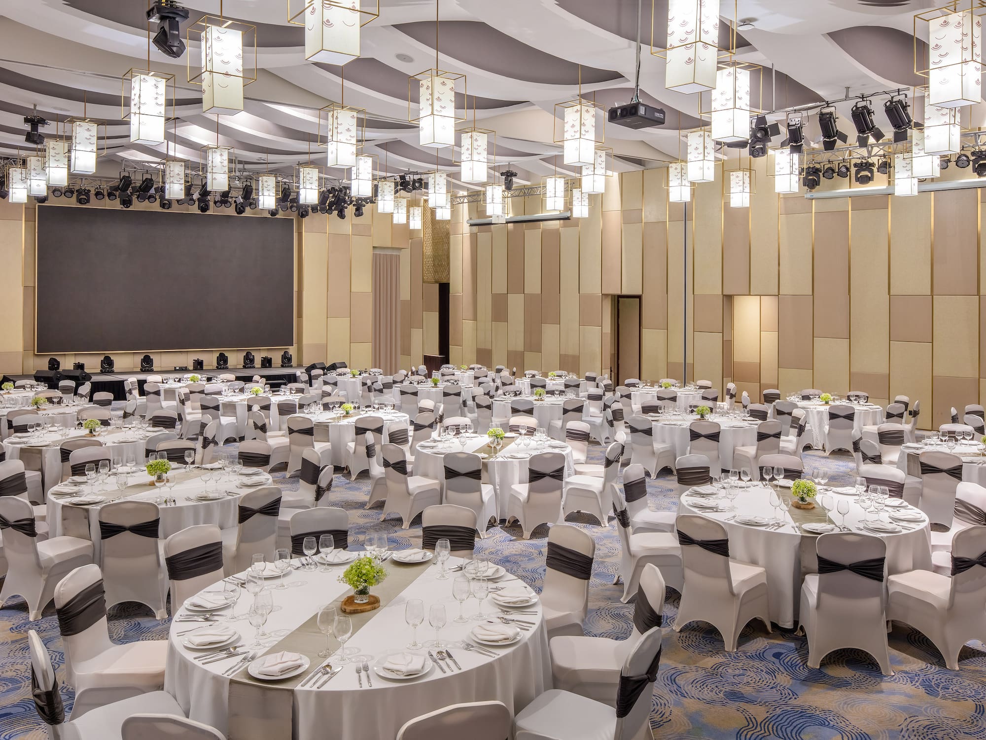 a large room with tables and chairs