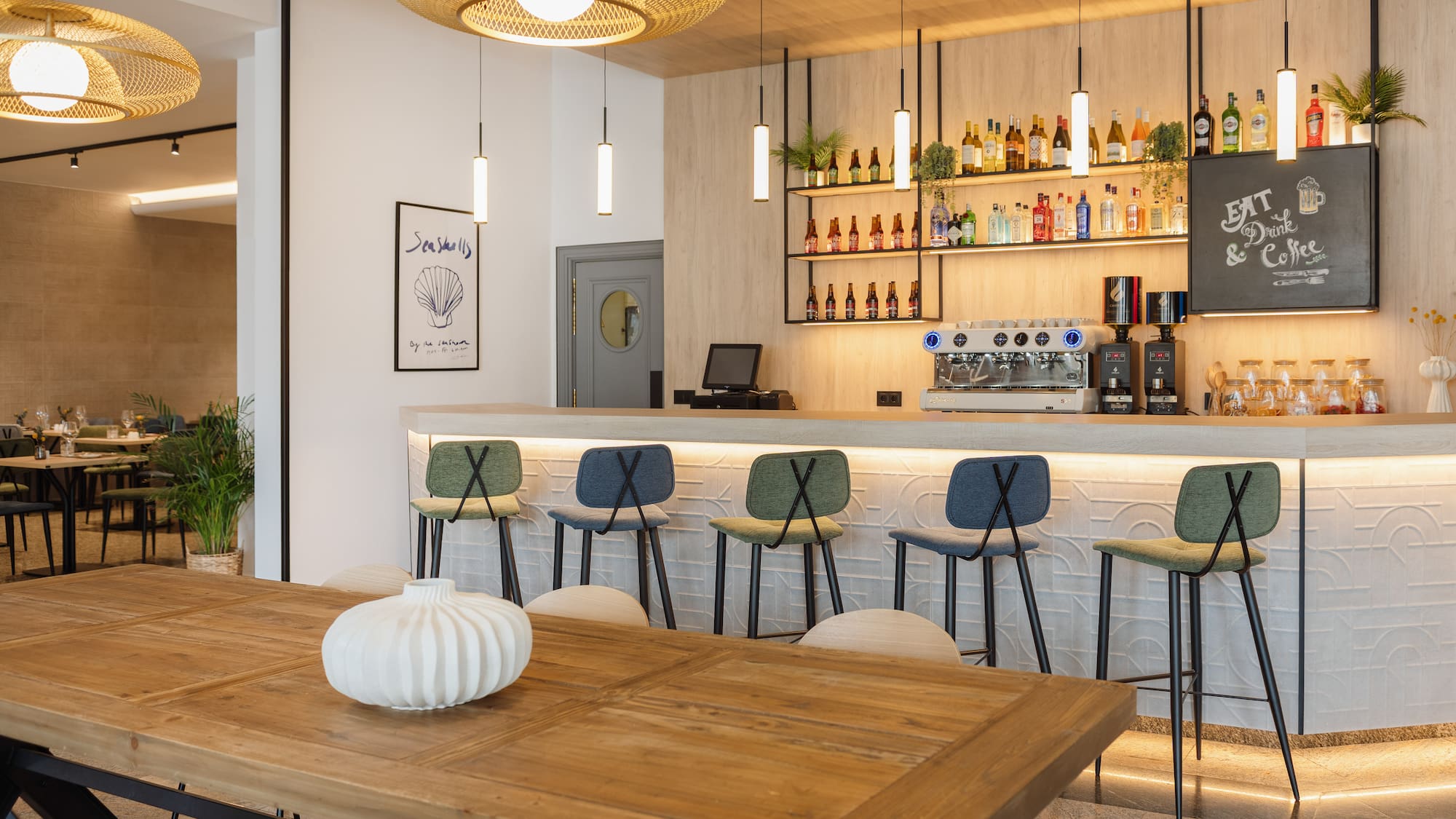 a bar with a table and chairs