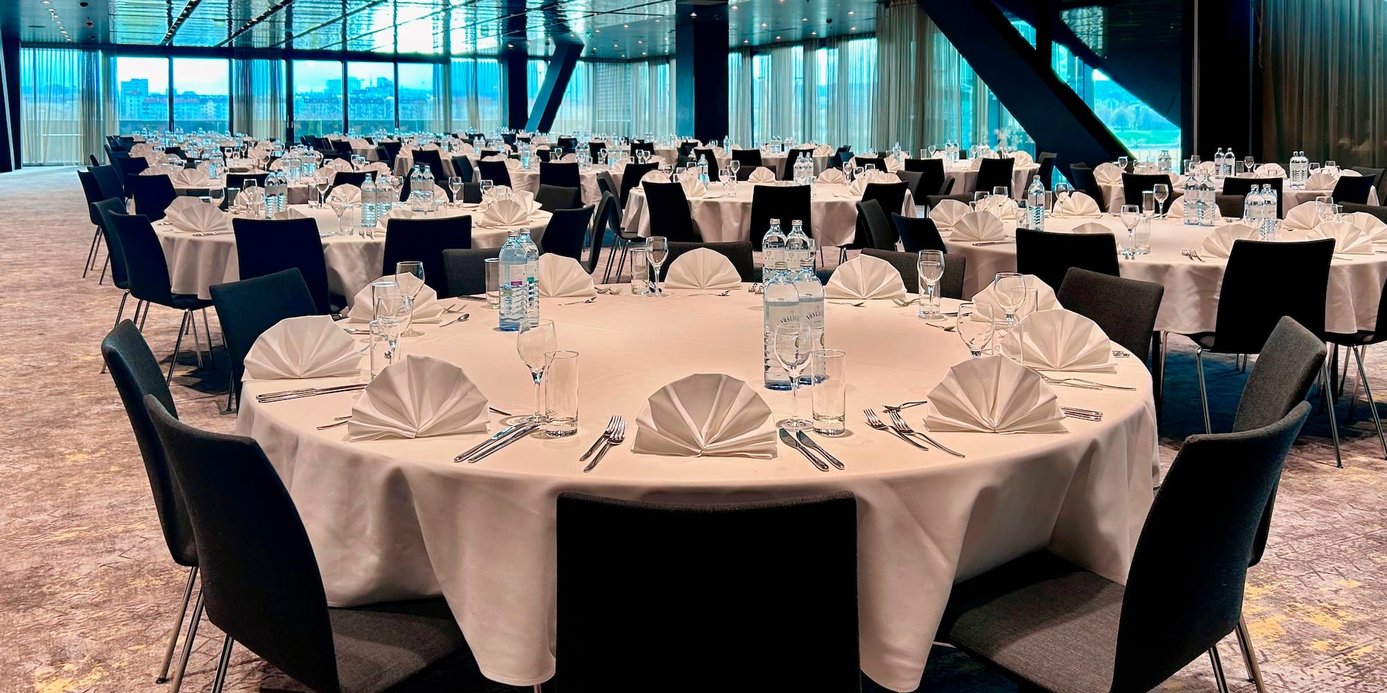 a large room with tables and chairs