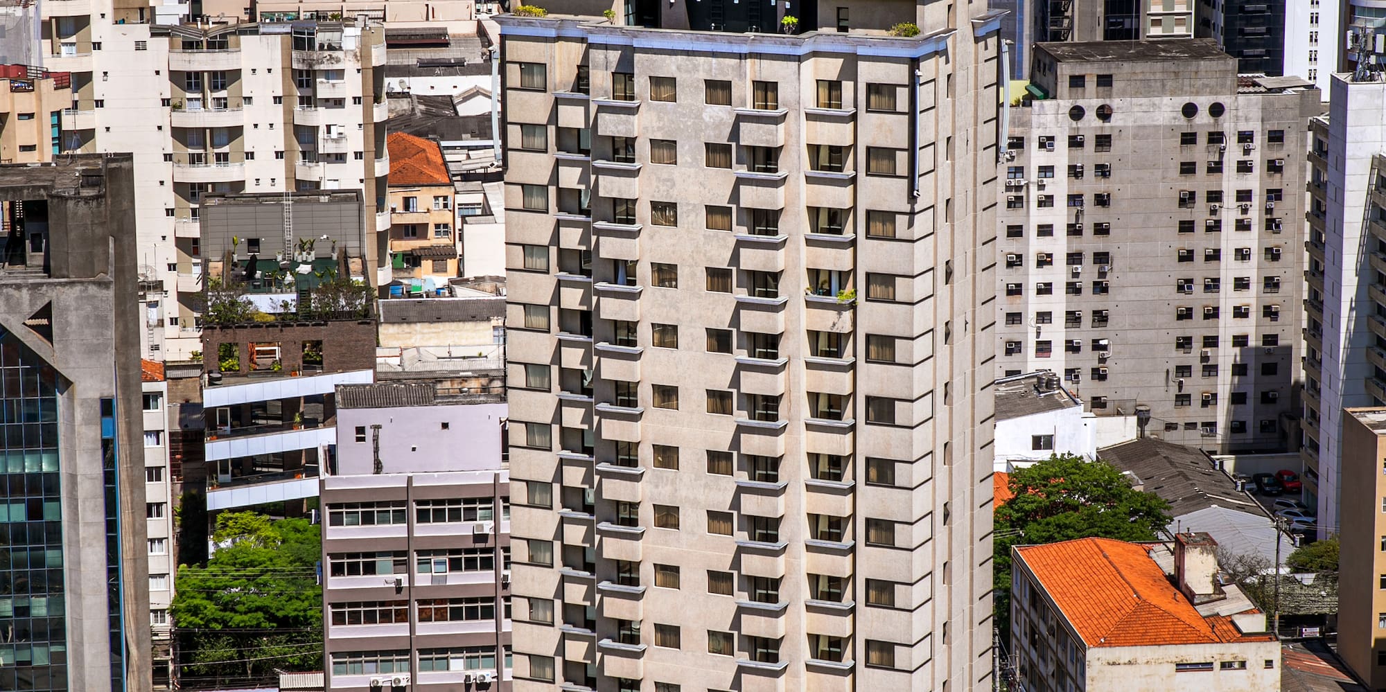 a tall building with a clock on top