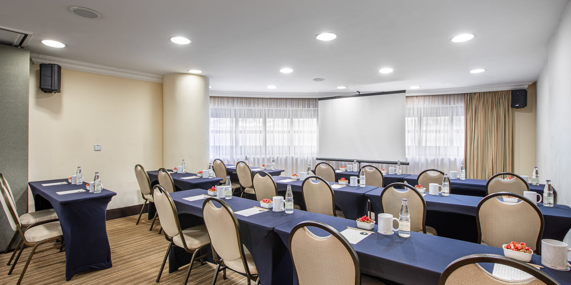 a room with tables and chairs