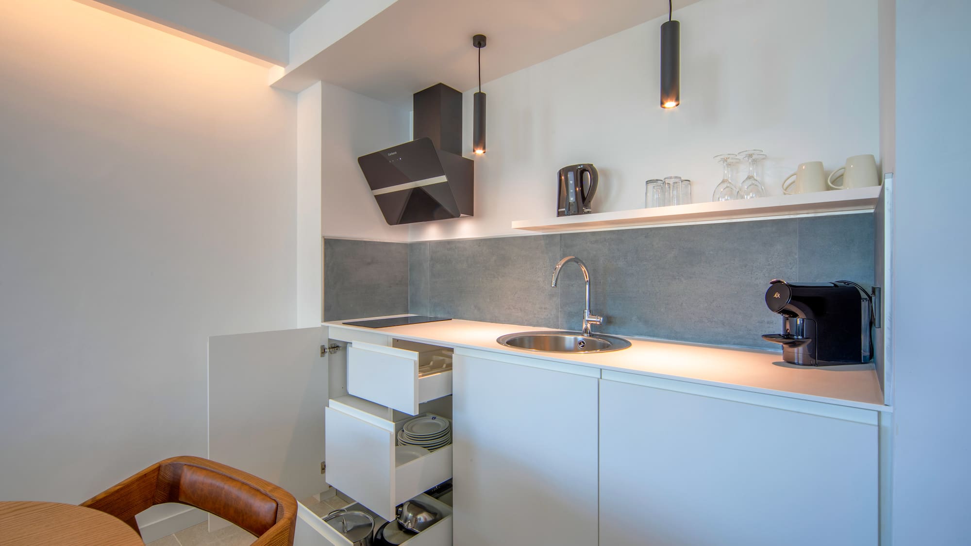 a kitchen with a sink and a counter