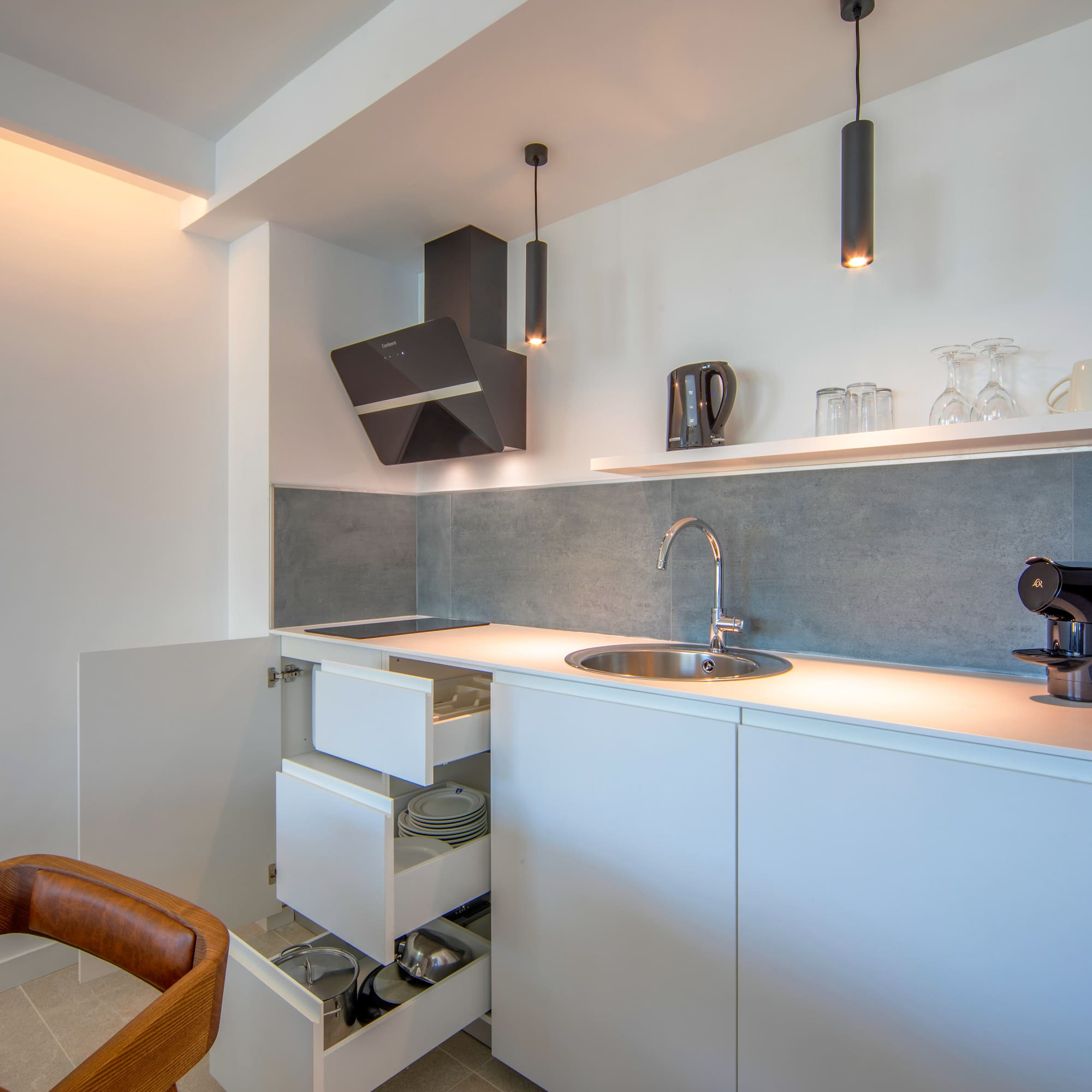 a kitchen with a sink and a counter