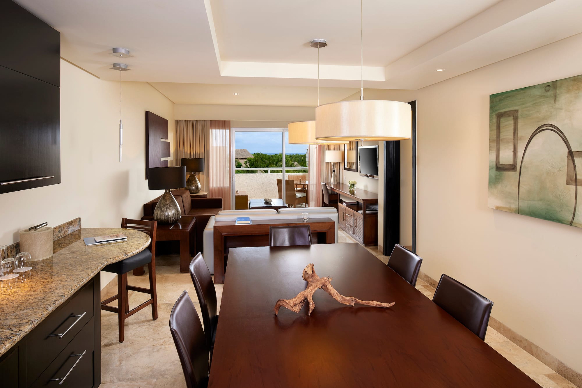 a room with a table and chairs