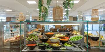 a buffet with bowls of food