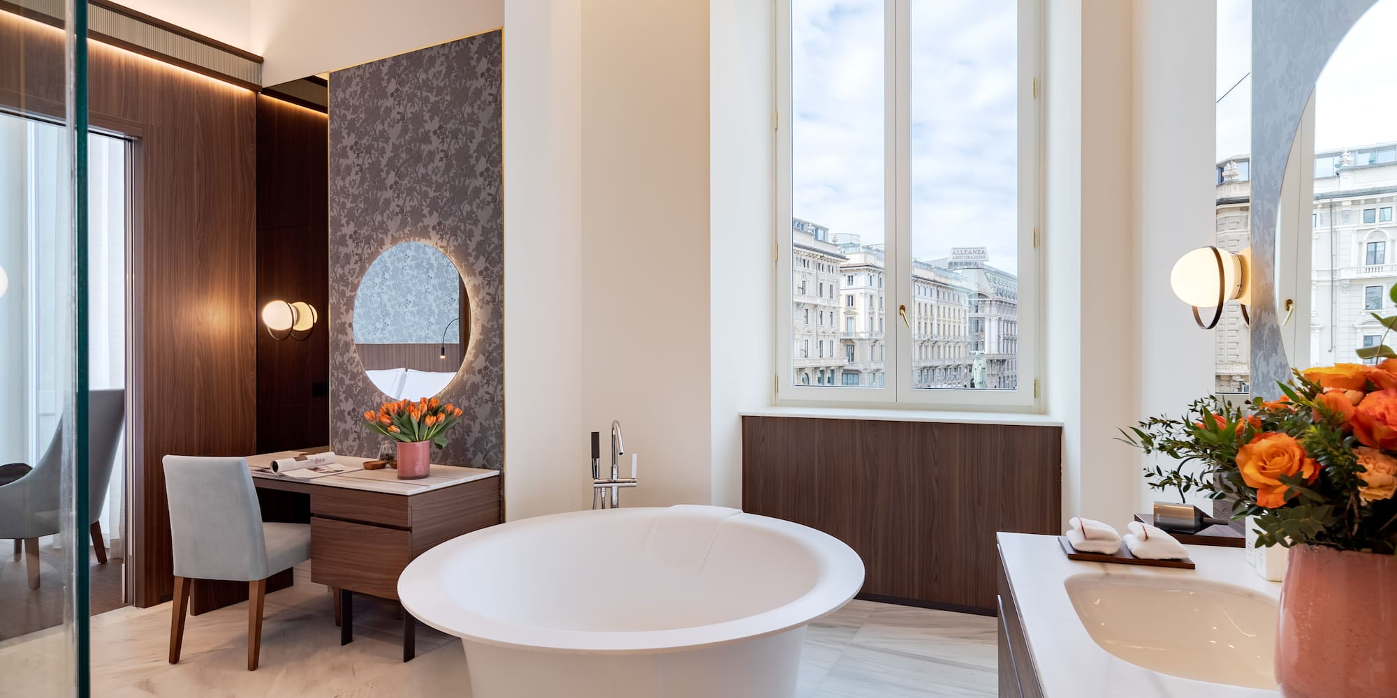 a bathroom with a tub and sink