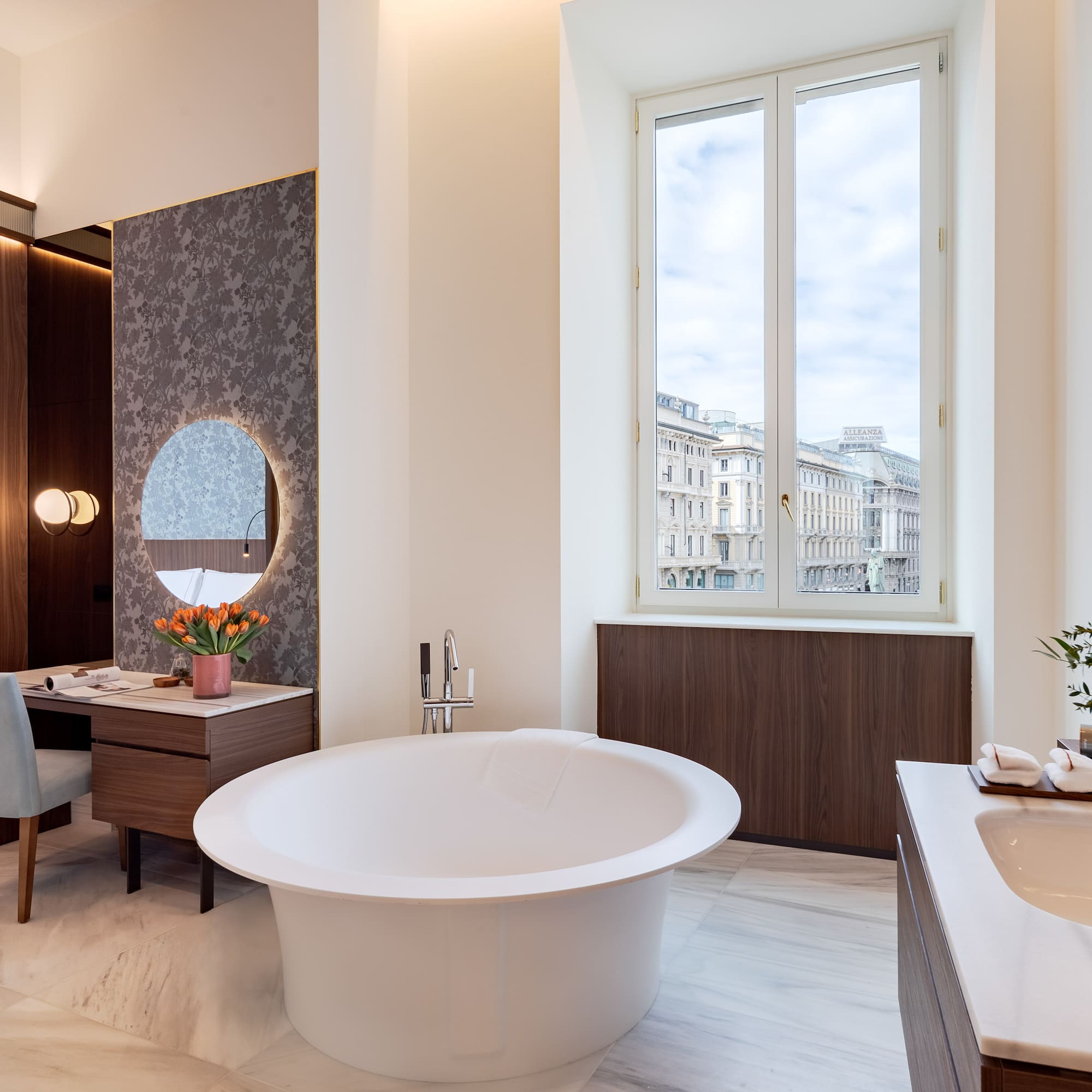 a bathroom with a tub and sink