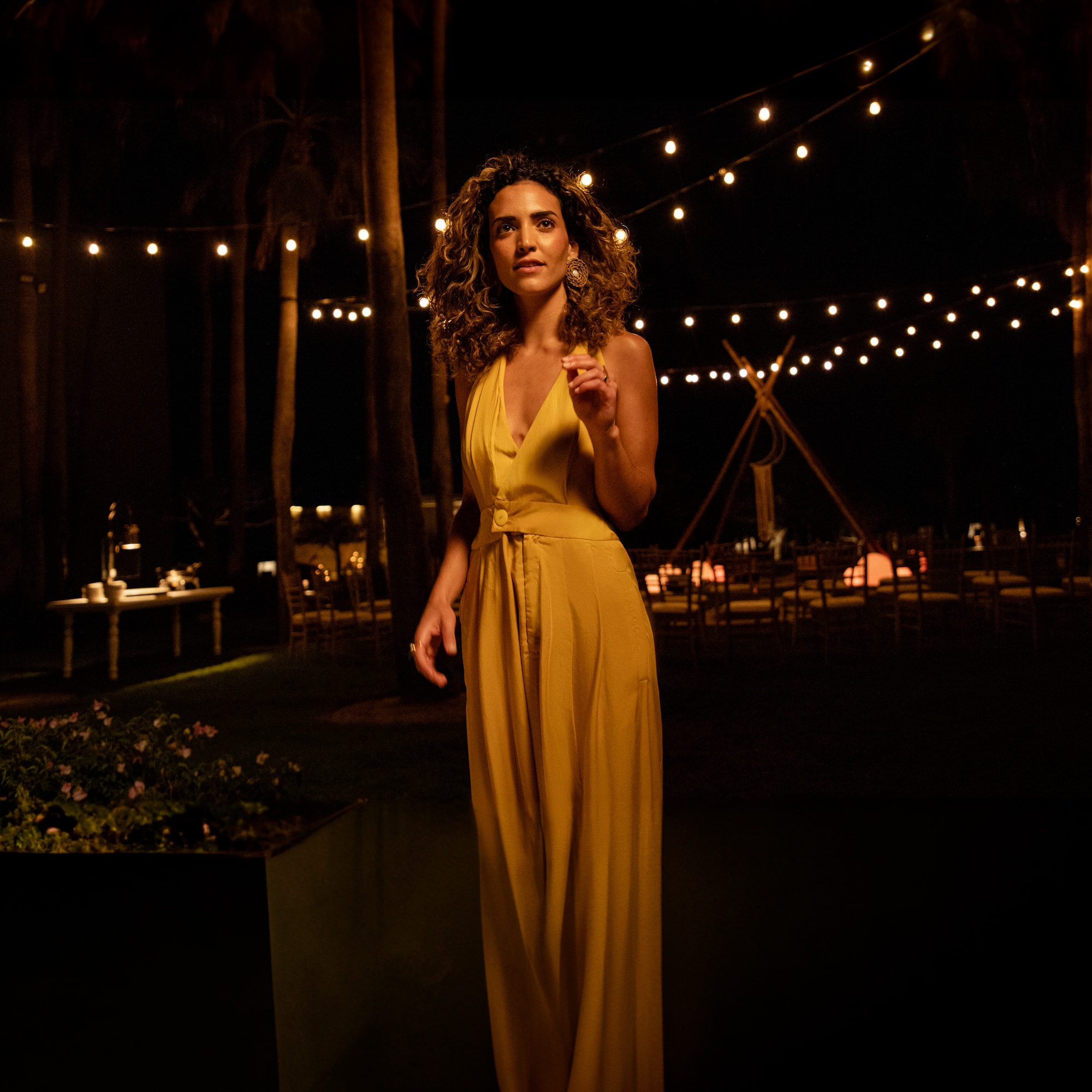 a woman in a yellow dress