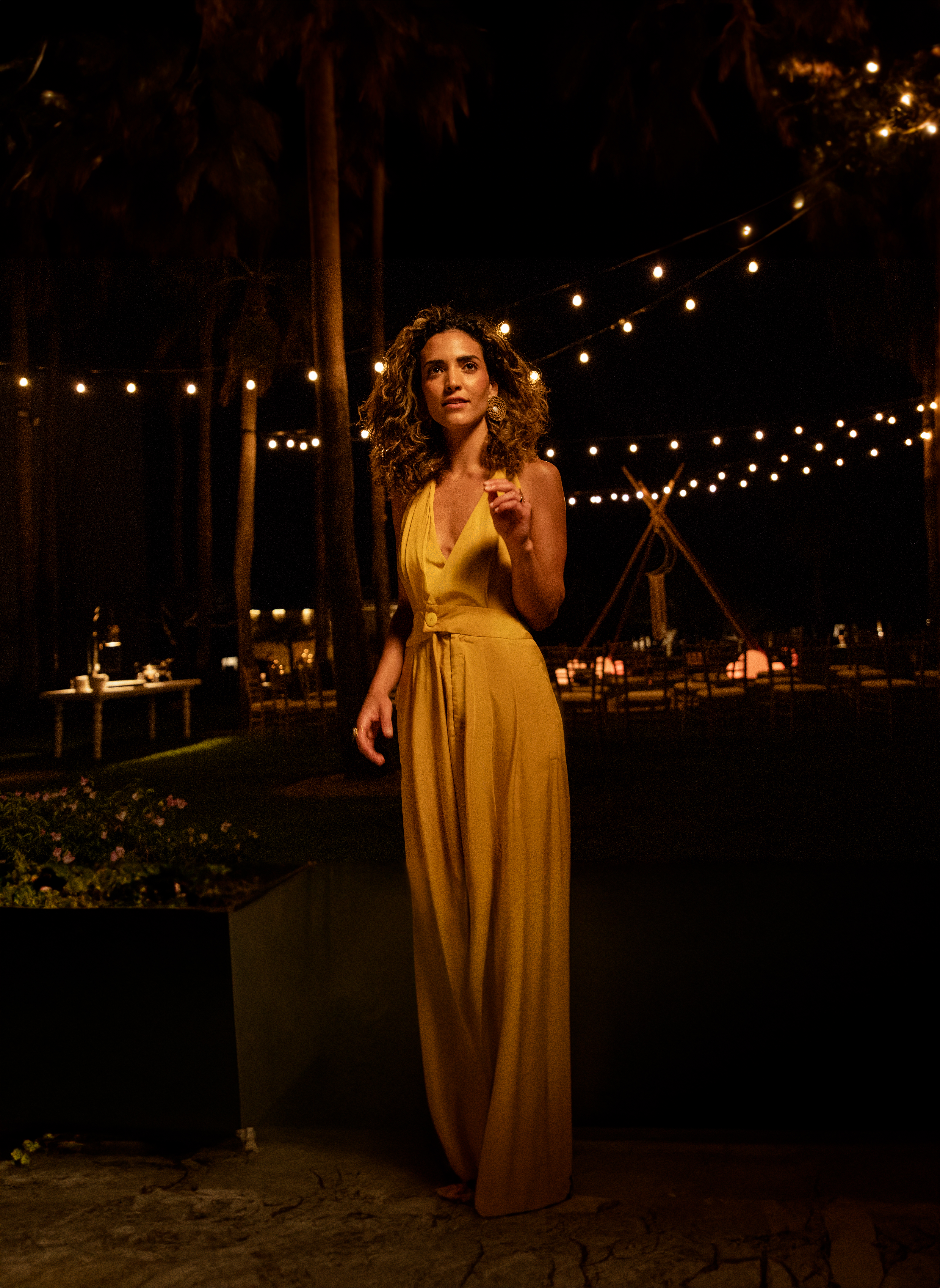 a woman in a yellow dress