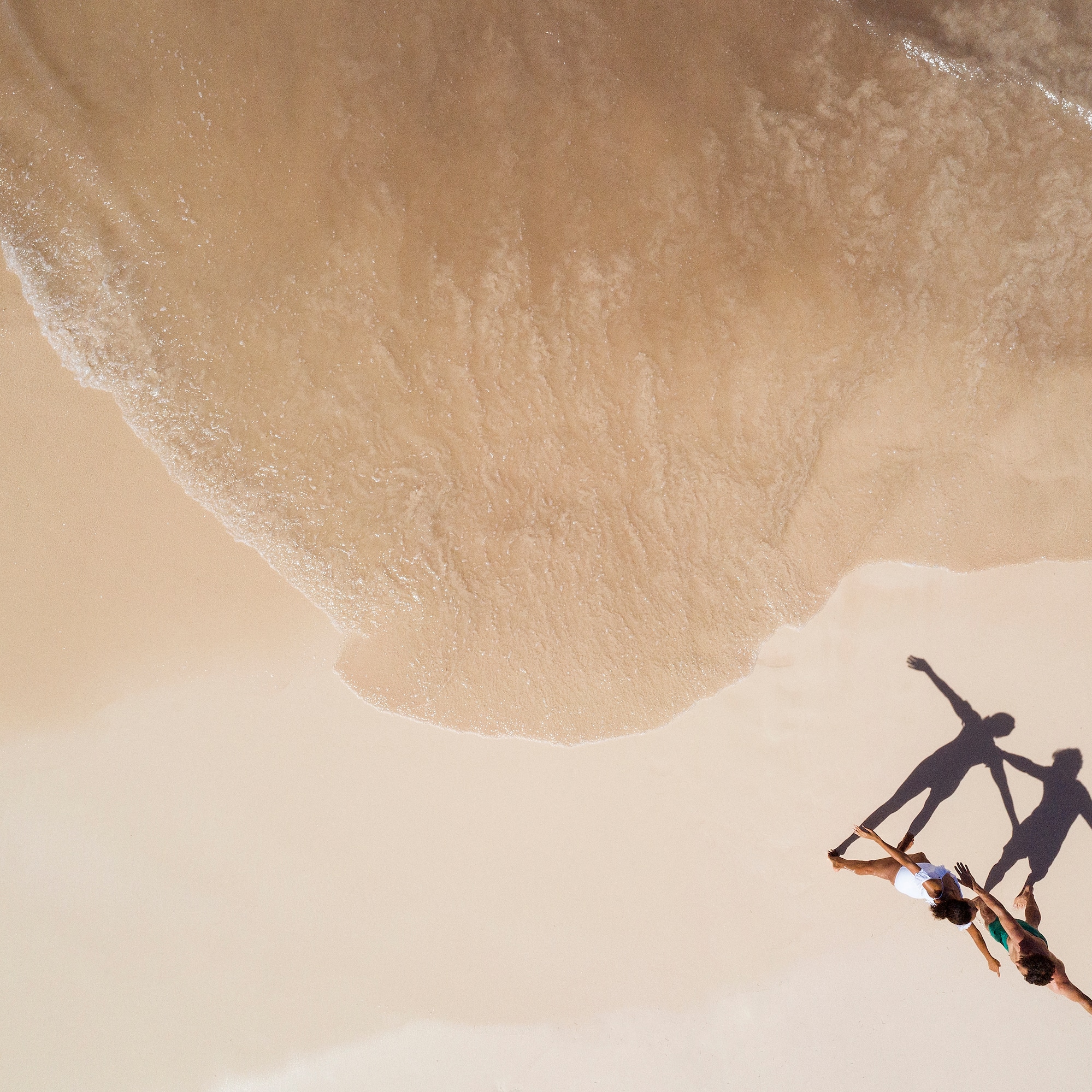 a group of people on a beach