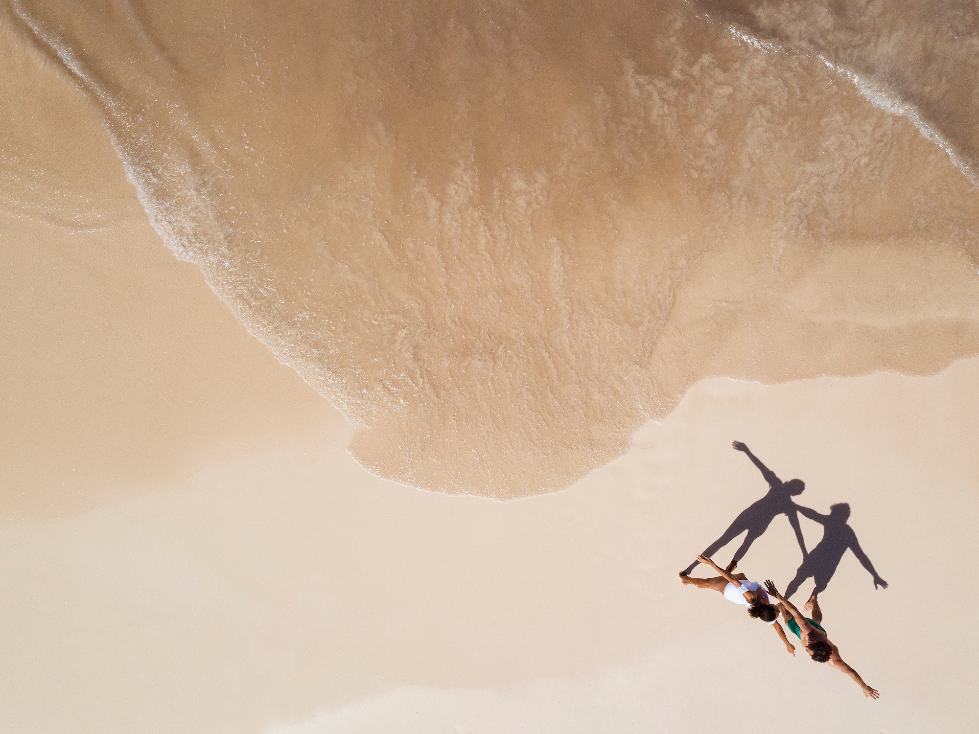 a group of people on a beach