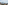 a city skyline with a building in the background