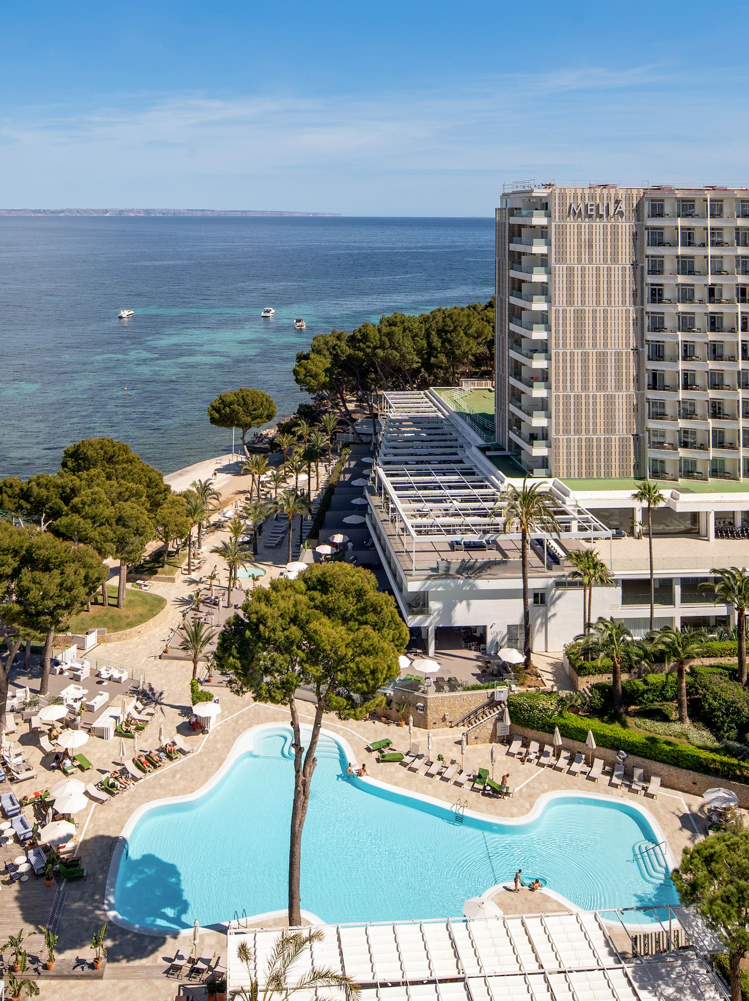 a swimming pool next to a building