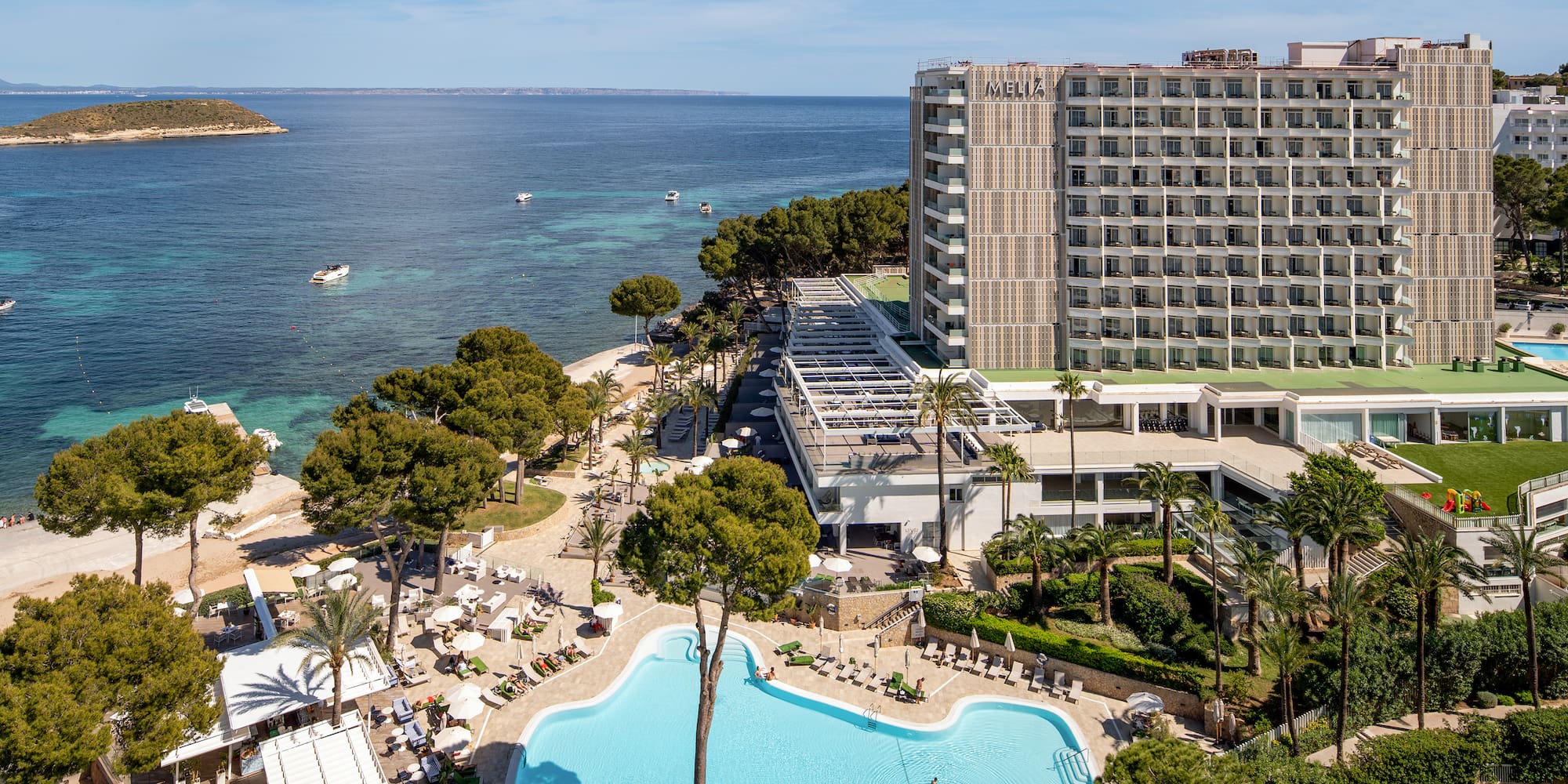 a swimming pool next to a building
