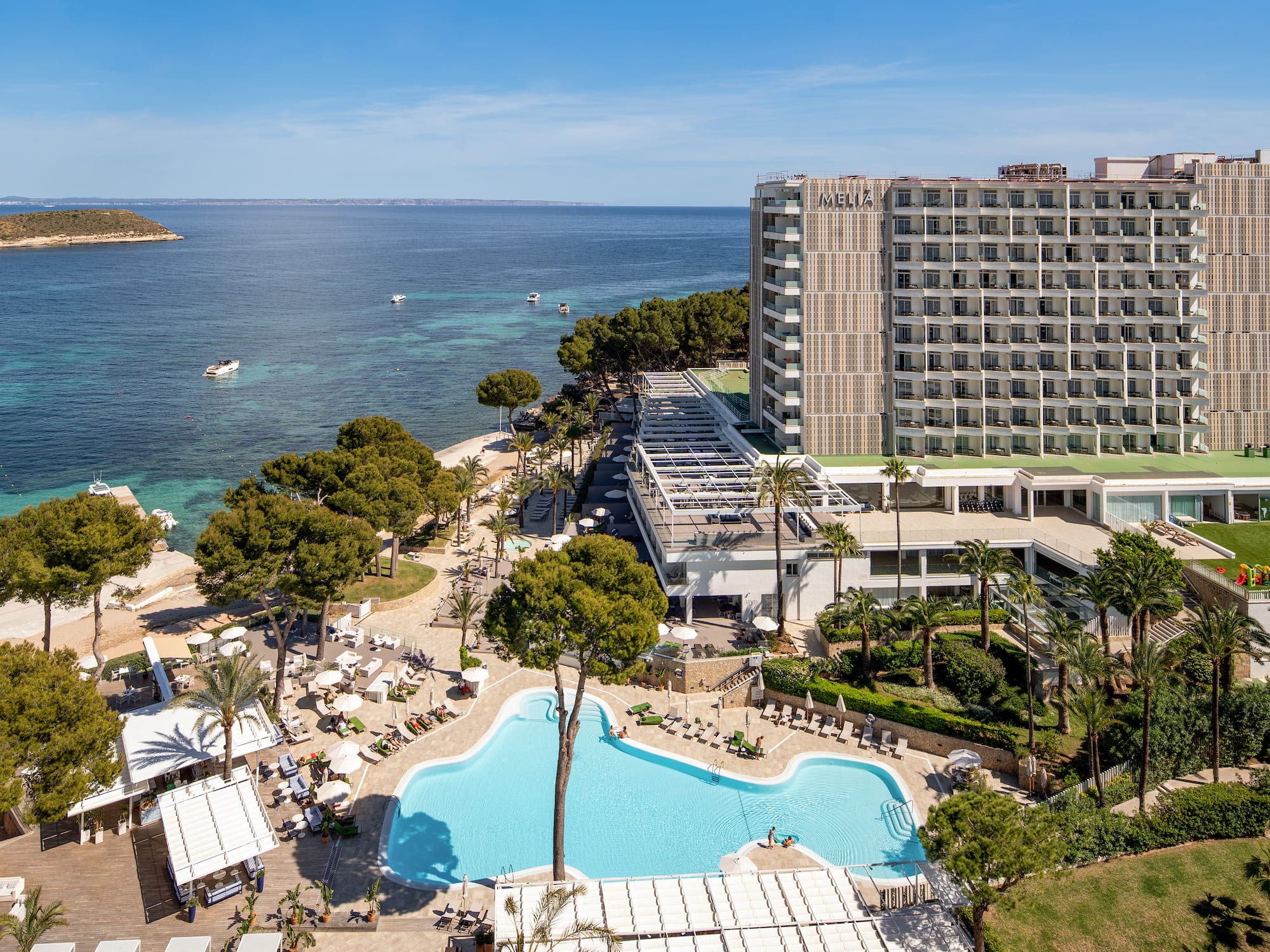 a swimming pool next to a building