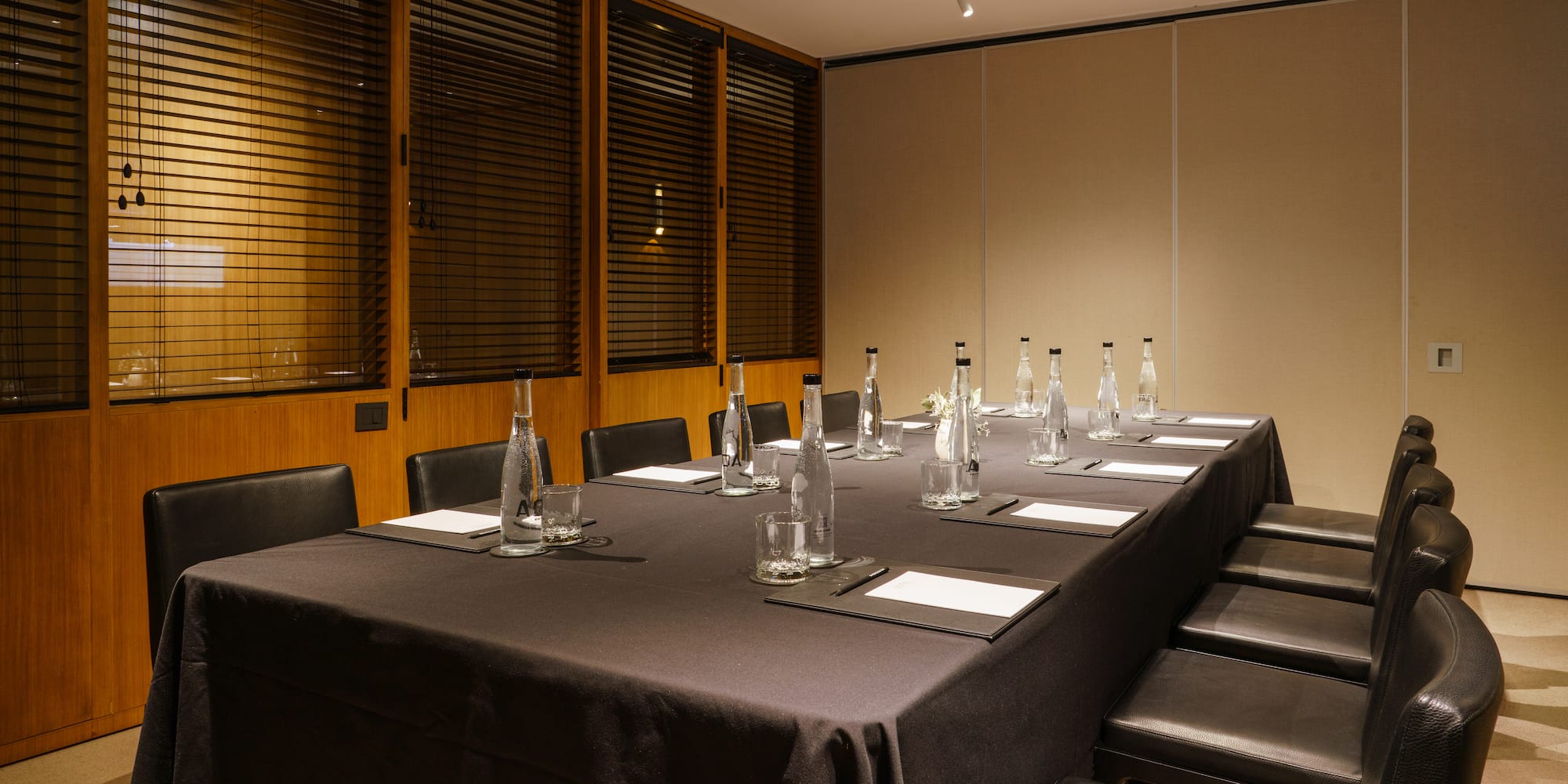 a table with bottles and glasses on it