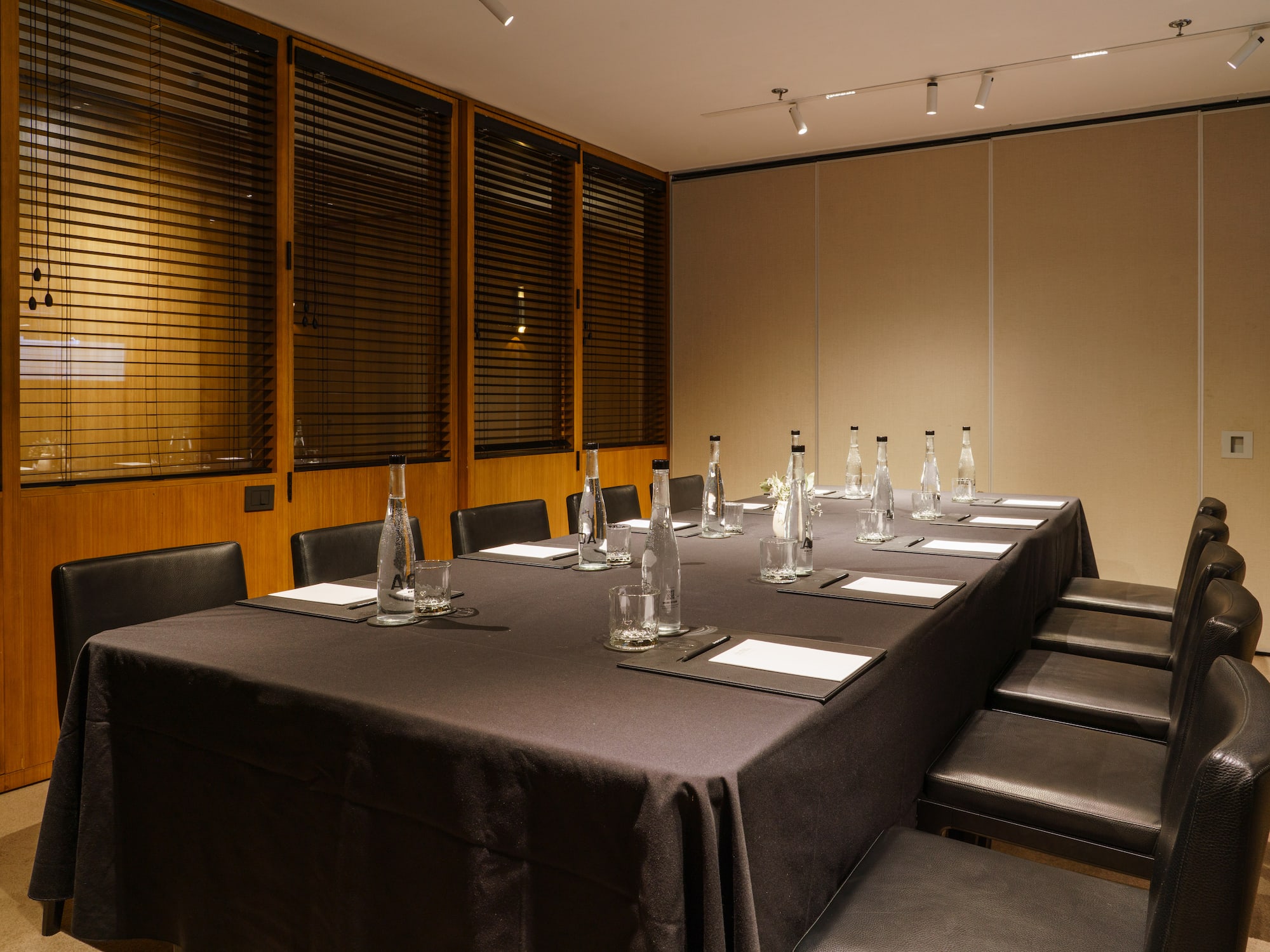 a table with bottles and glasses on it