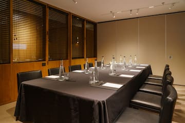 a table with bottles and glasses on it