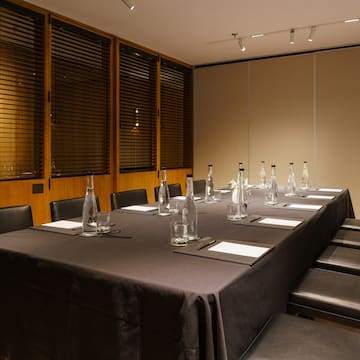 a table with bottles and glasses on it