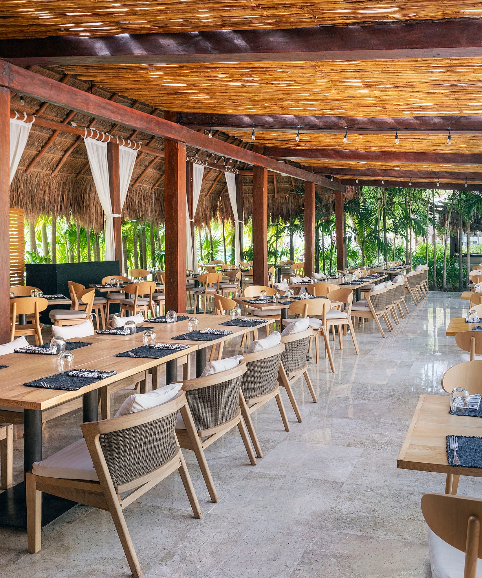 a restaurant with tables and chairs