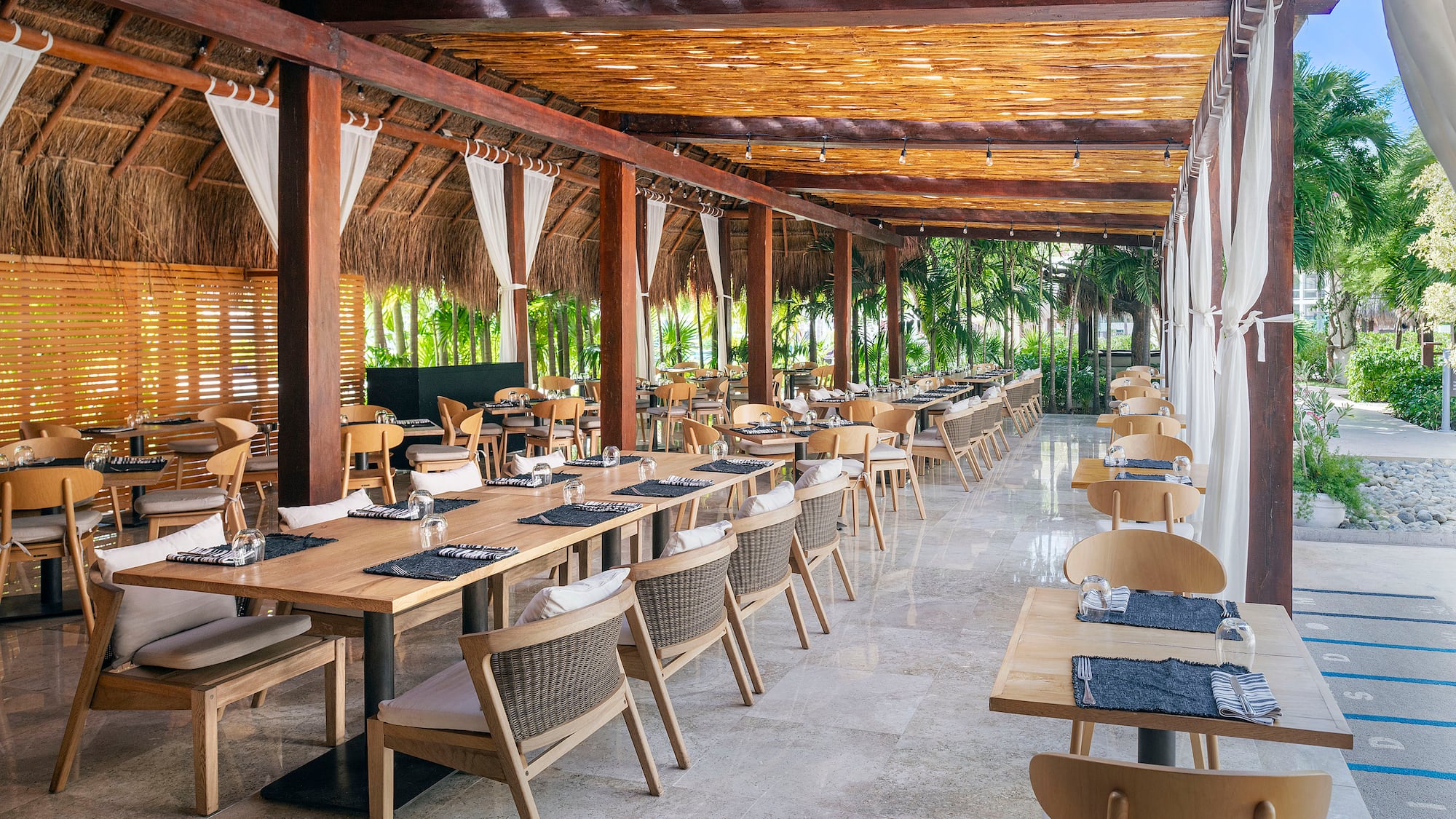 a restaurant with tables and chairs
