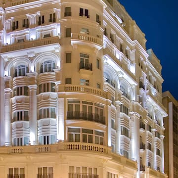 a building with many windows and balconies