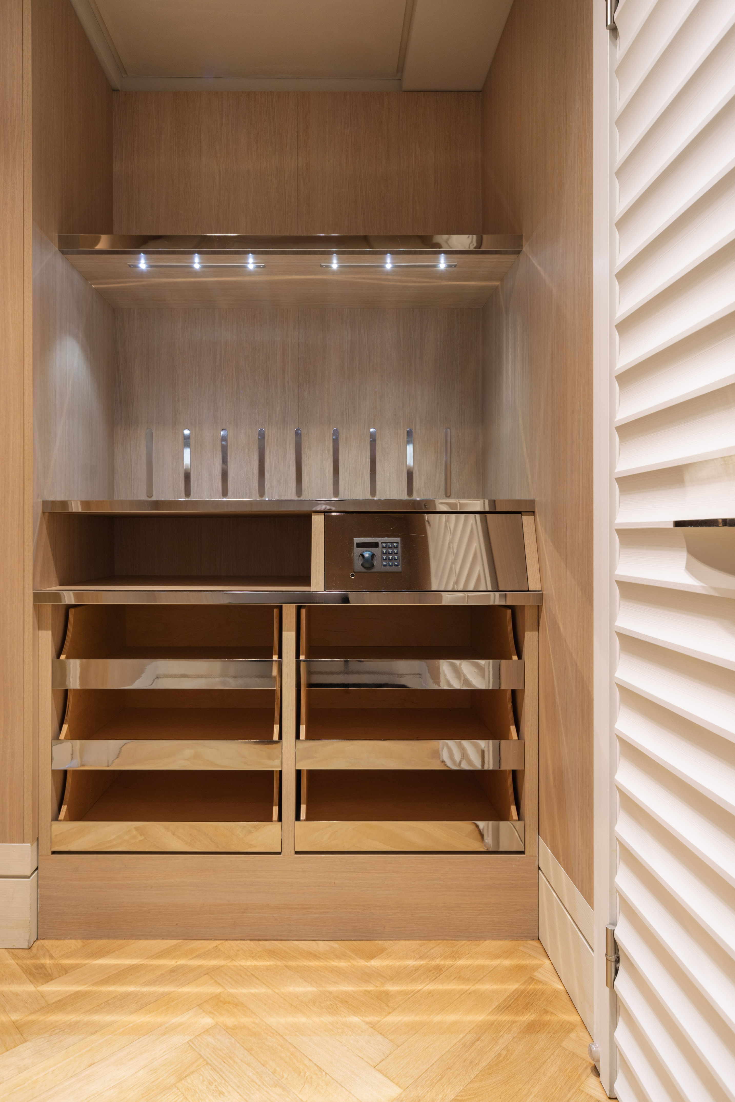 a wooden shelf with shelves and lights