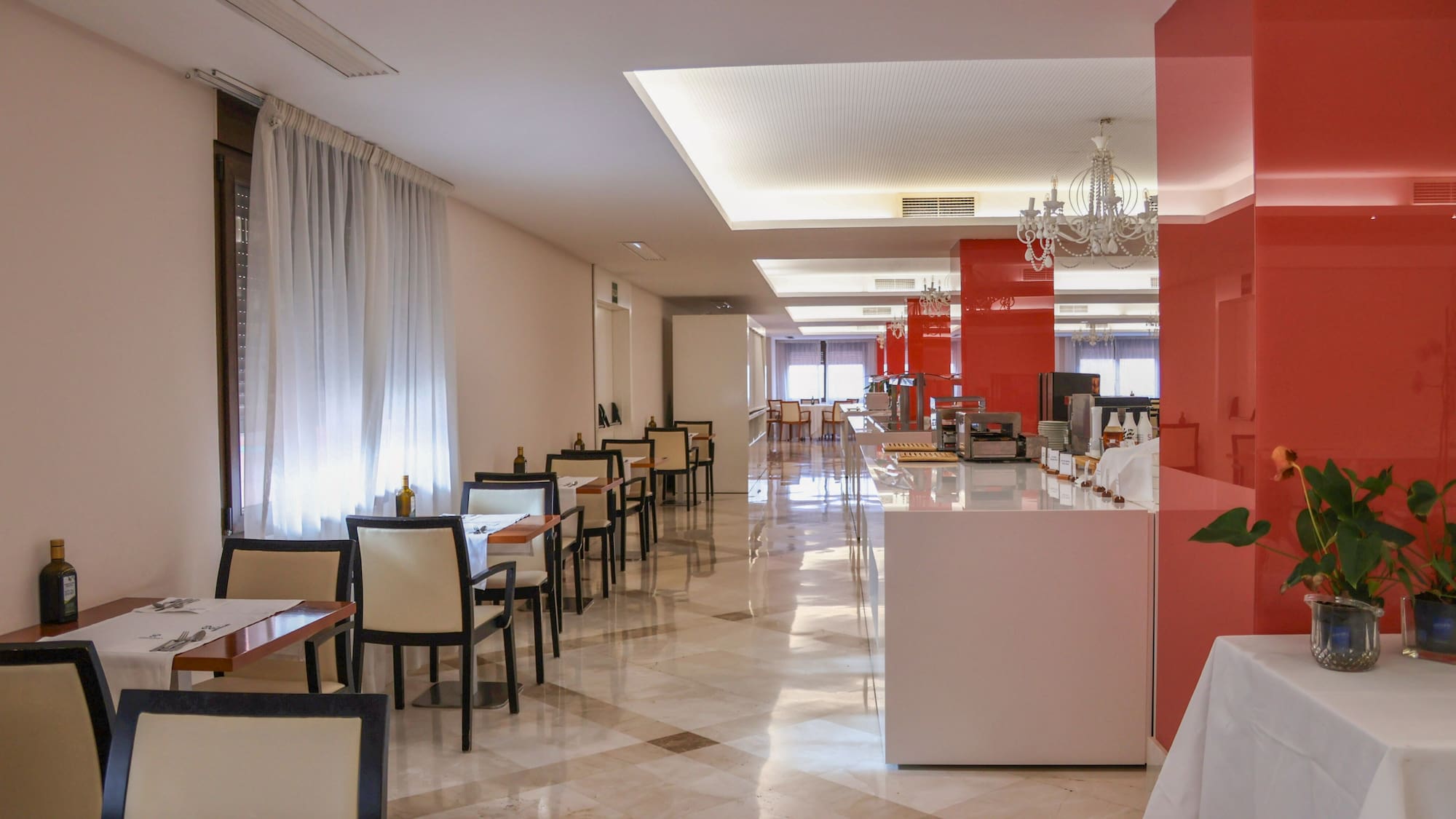 a room with tables and chairs