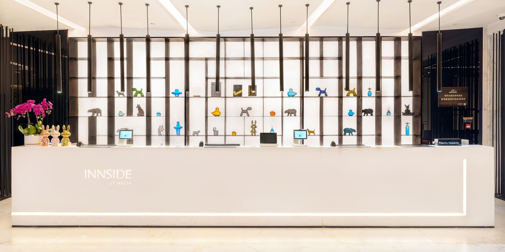 a white wall with many objects on it