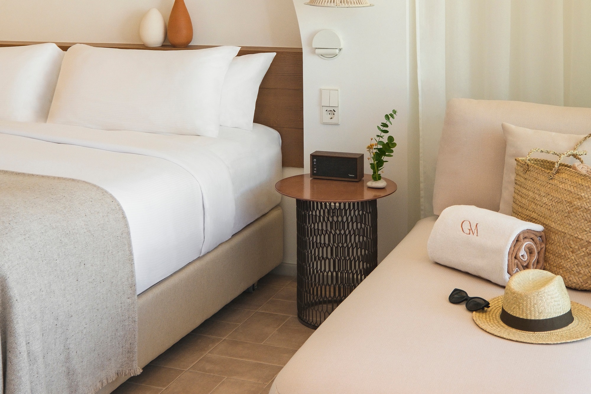 a bed and a chair in a room