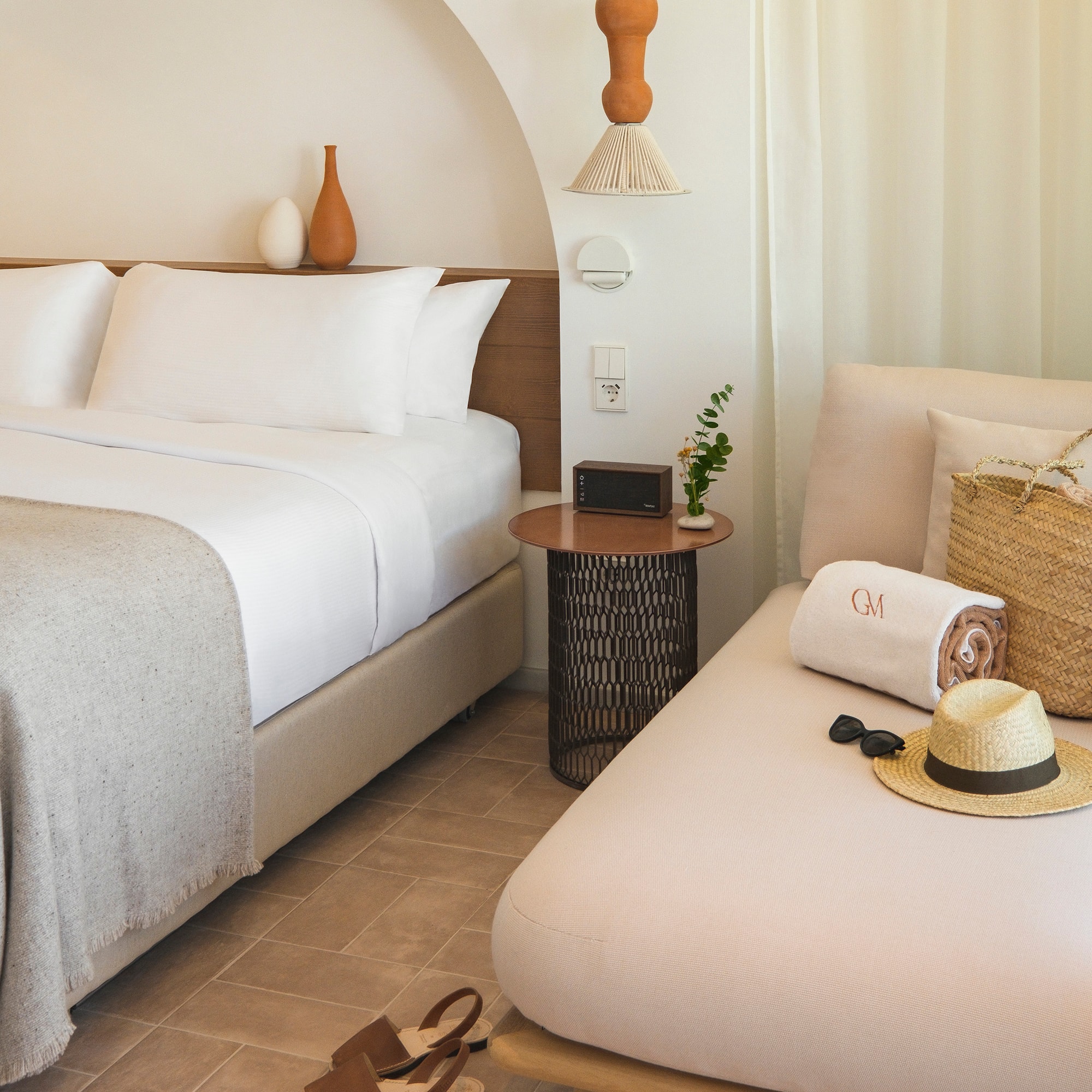 a bed and a chair in a room