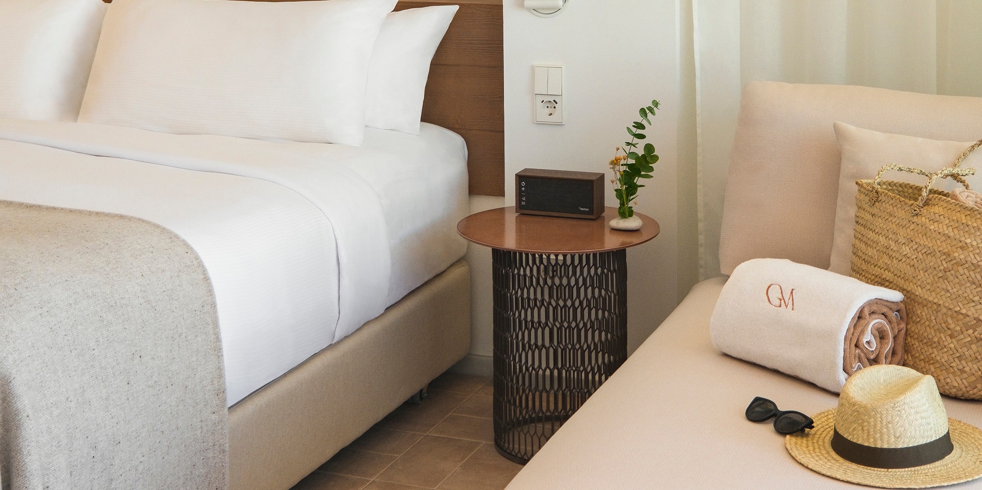 a bed and a chair in a room