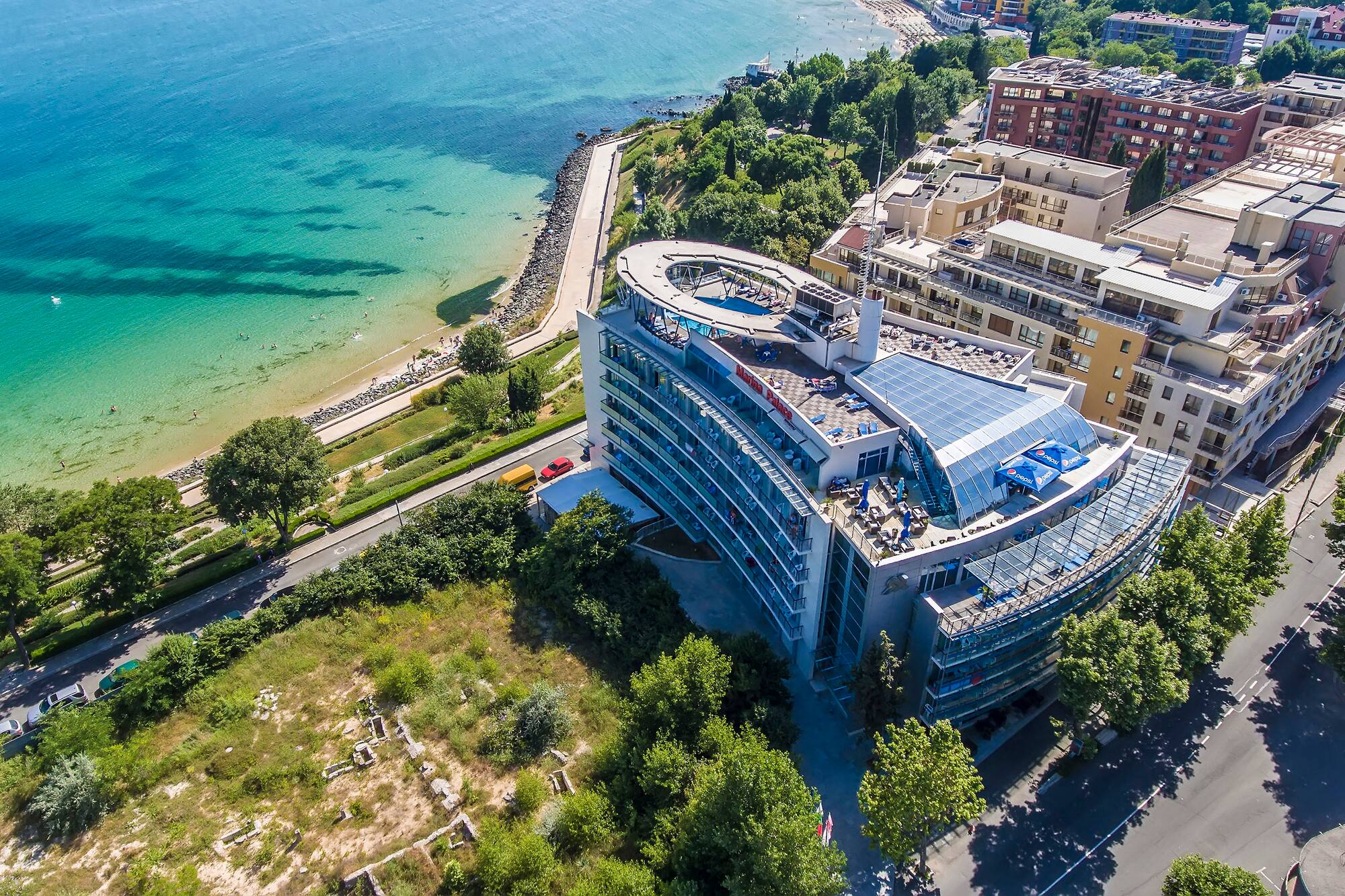 a building next to a body of water