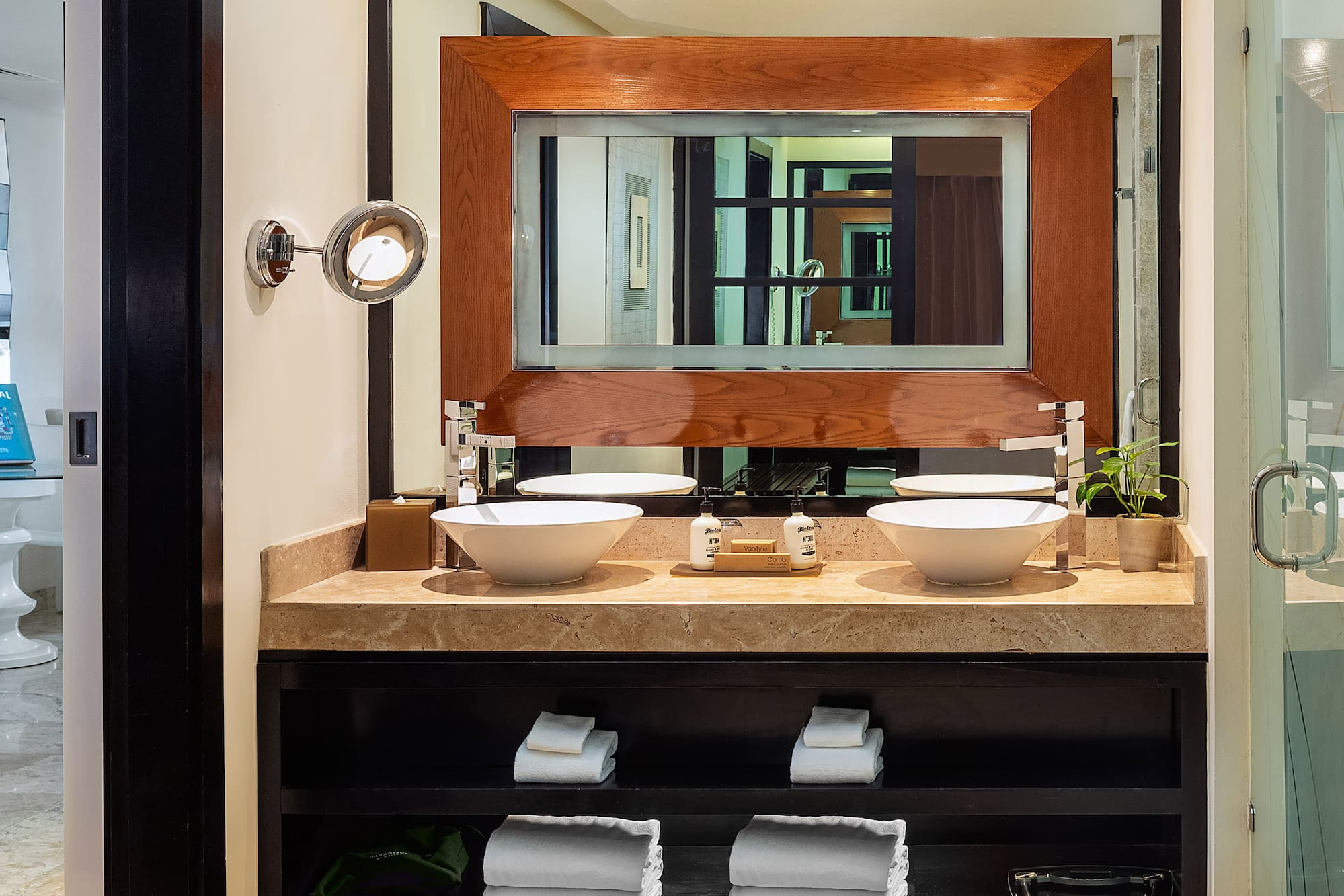 a bathroom with a mirror and sinks