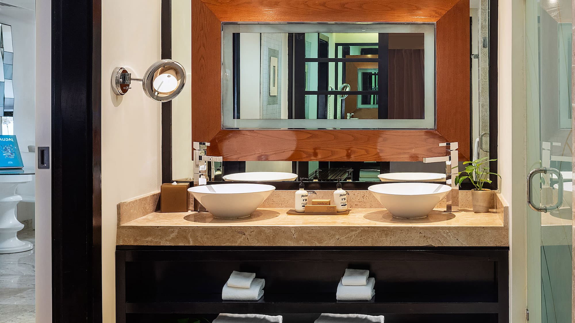 a bathroom with a mirror and sinks