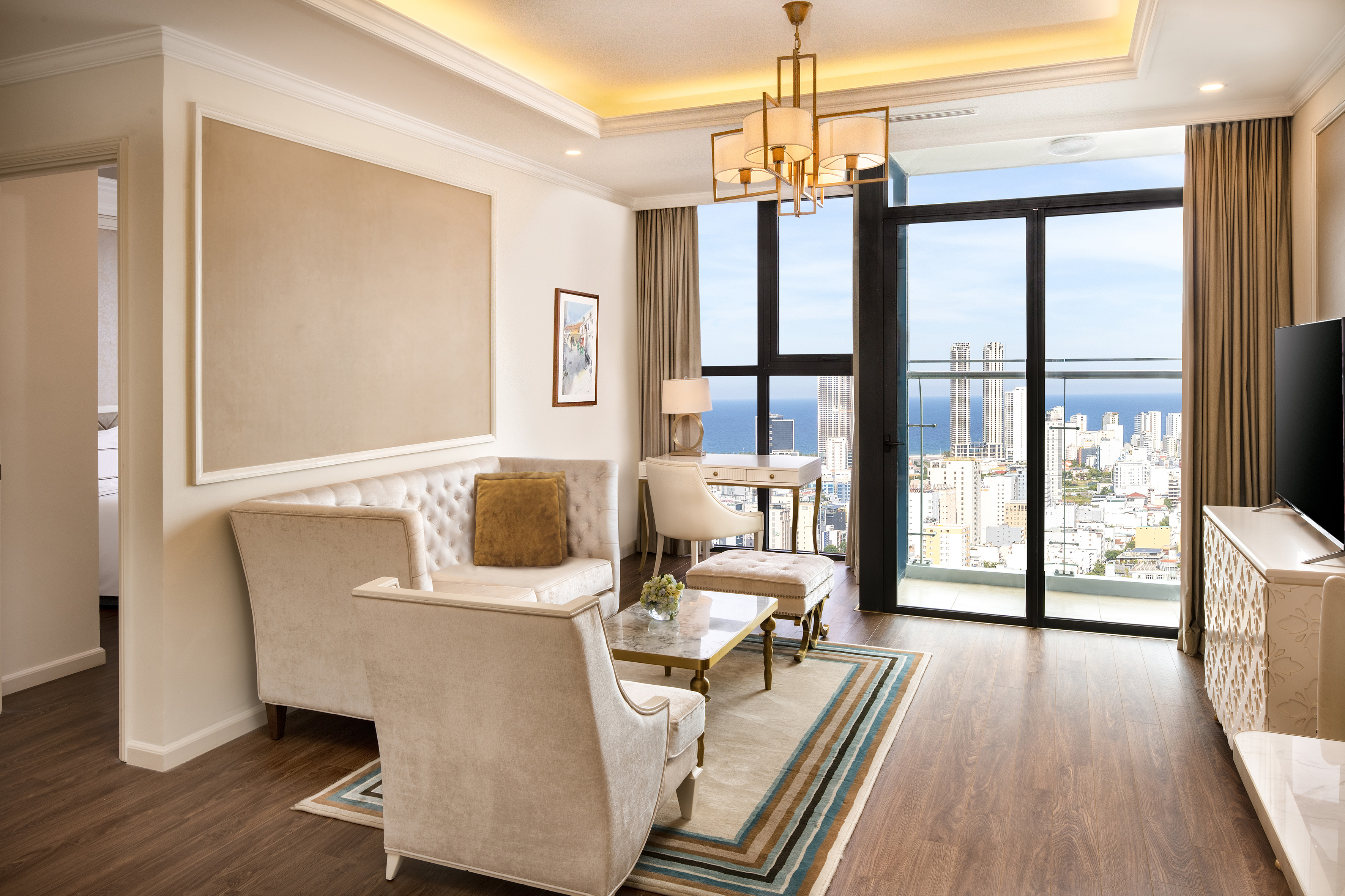 a living room with a view of a city