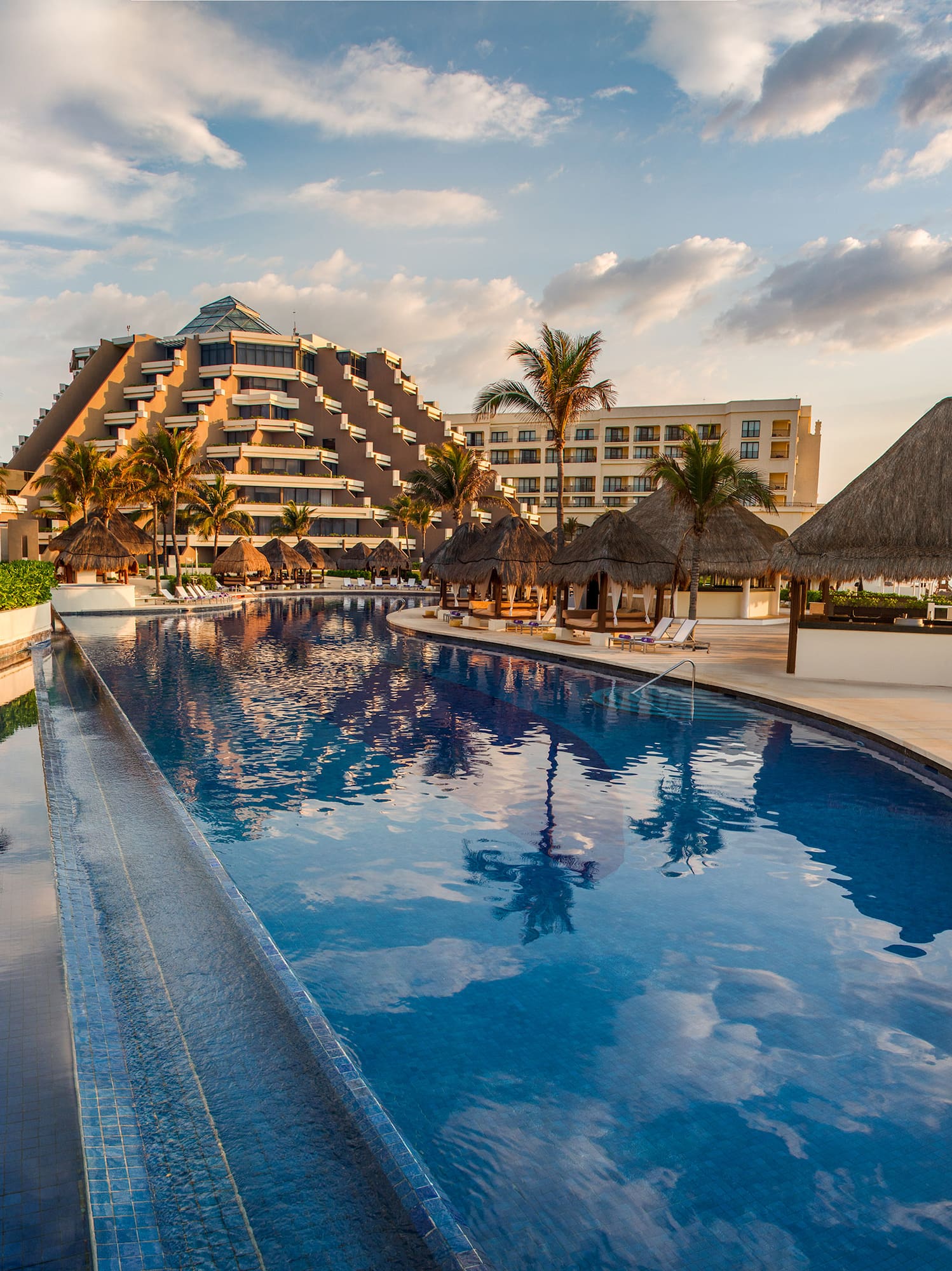a pool with a building in the background