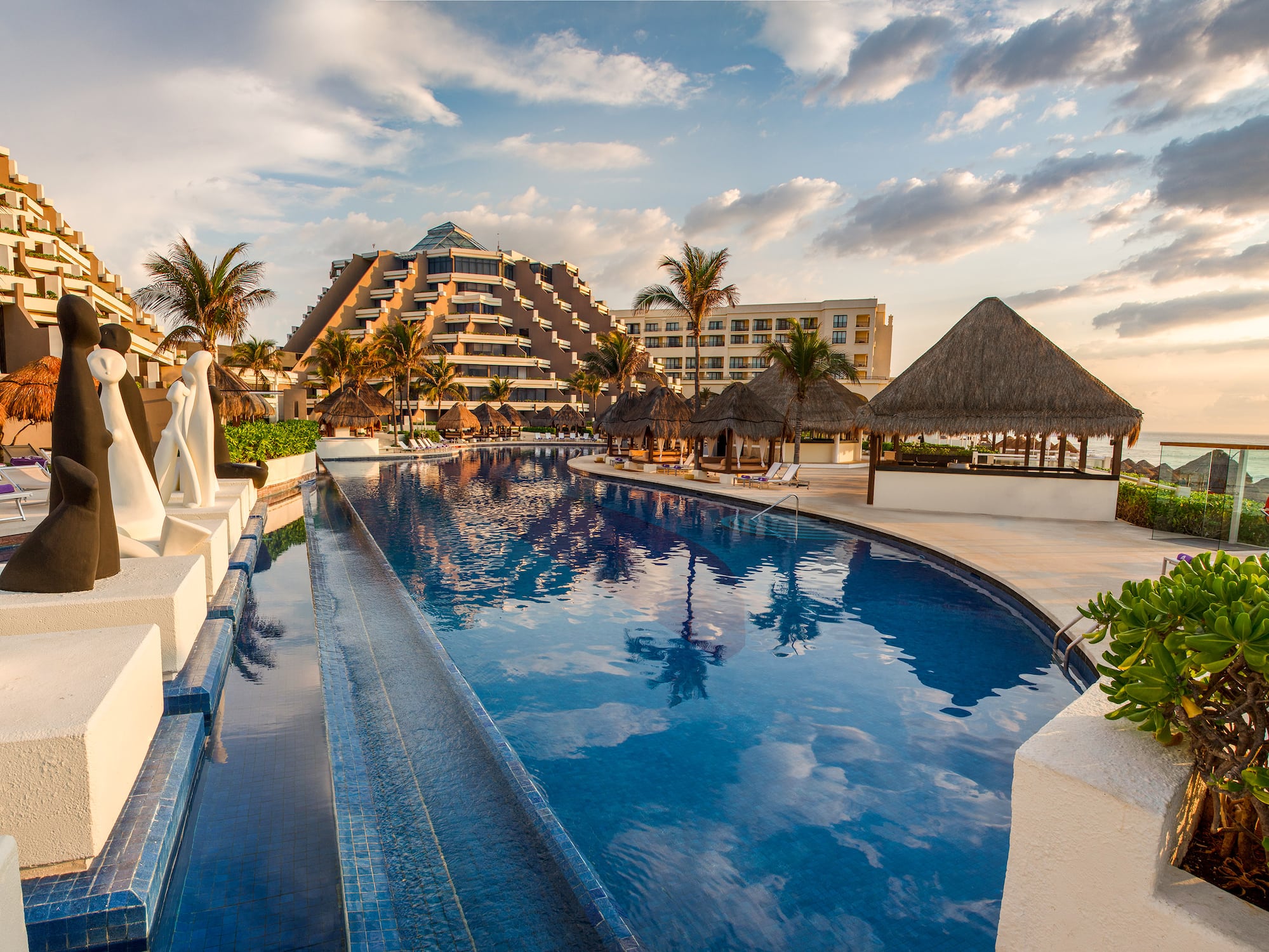 a pool with a building in the background