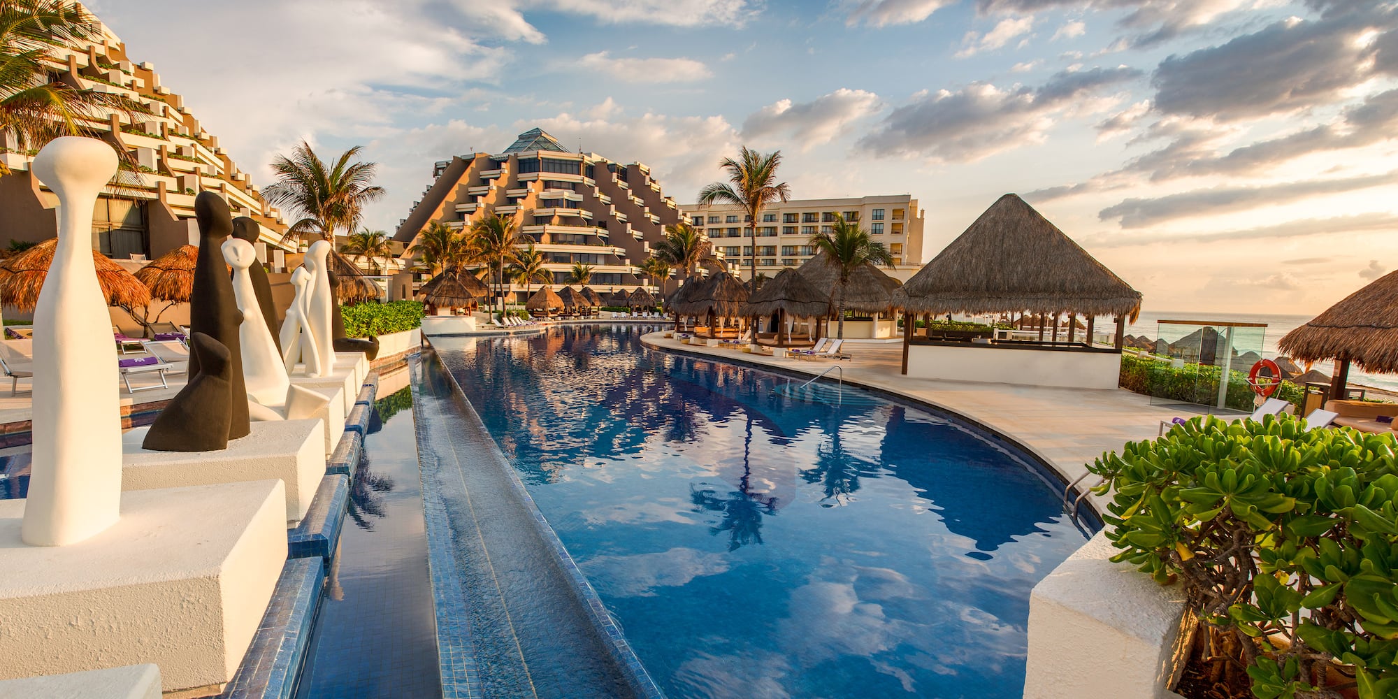 a pool with a building in the background