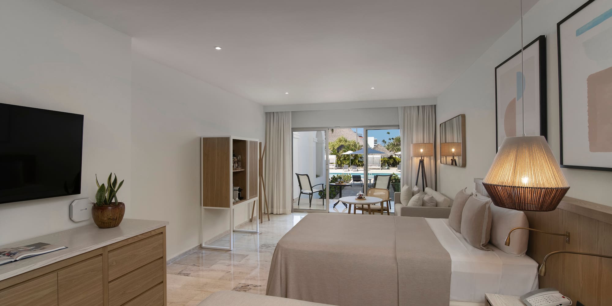 a bedroom with a bed and a table