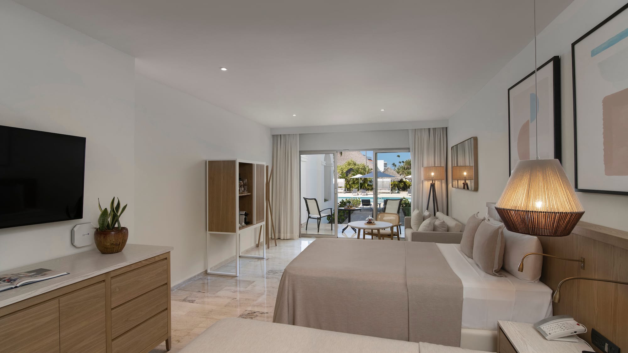 a bedroom with a bed and a table