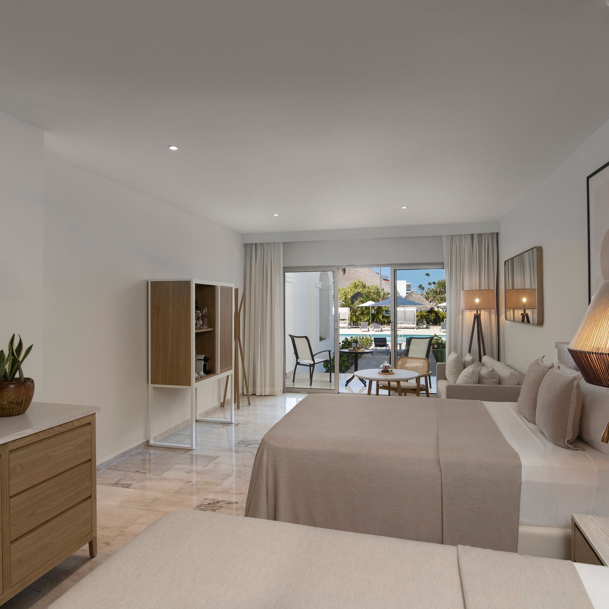 a bedroom with a bed and a table