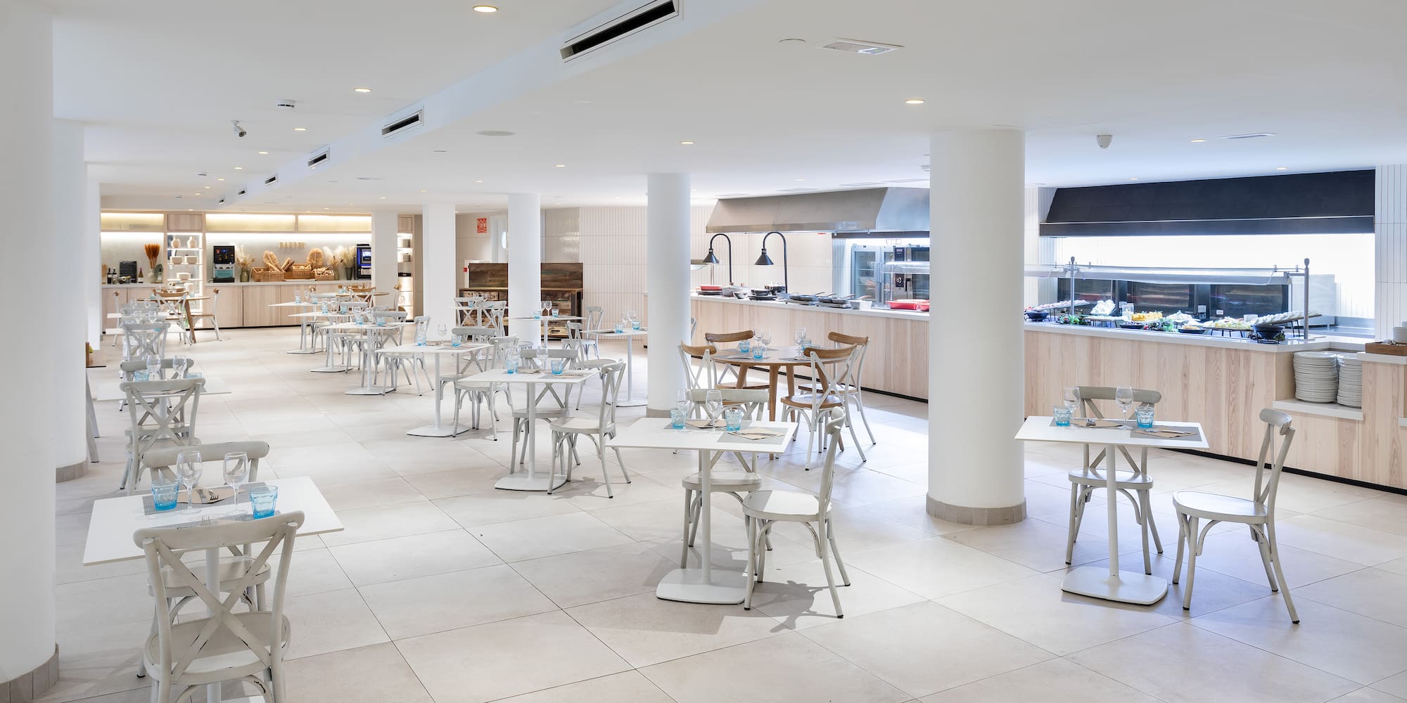 a large room with tables and chairs