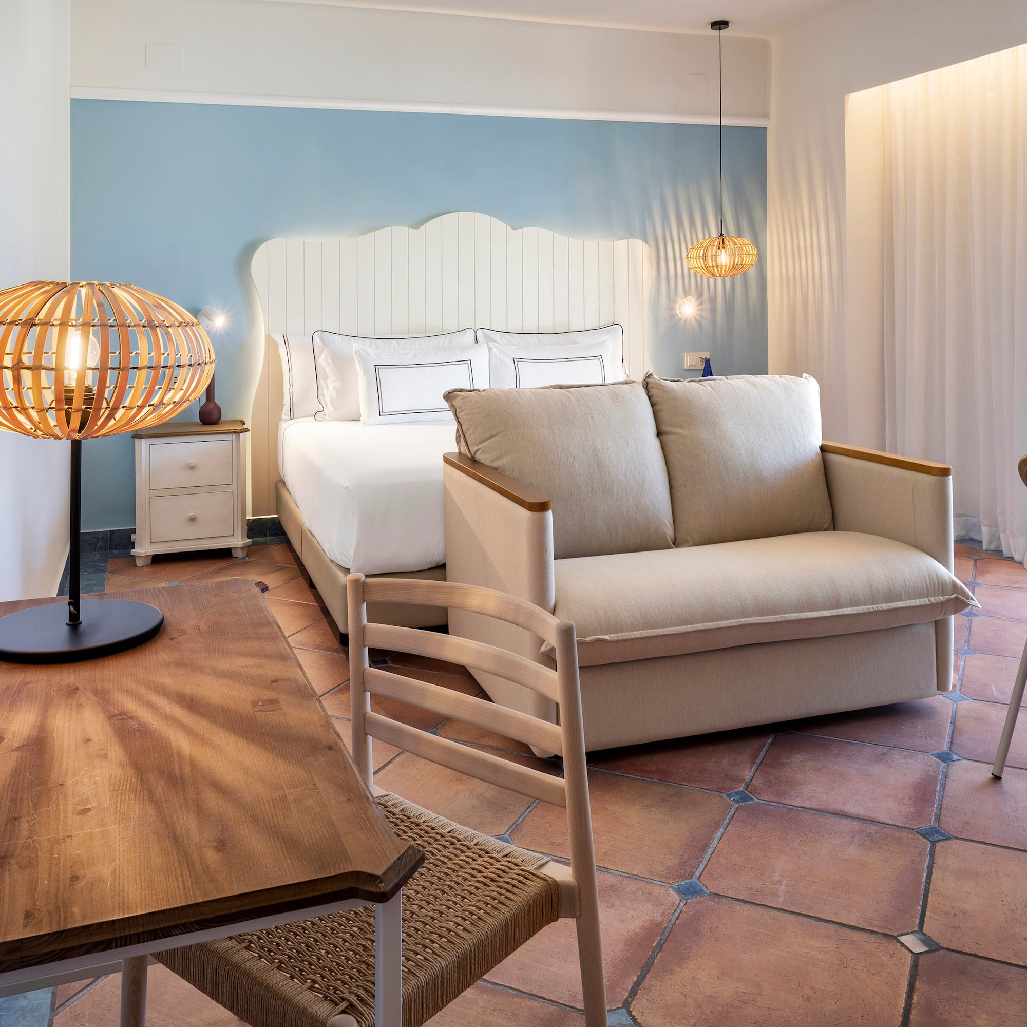 a room with a bed and a table