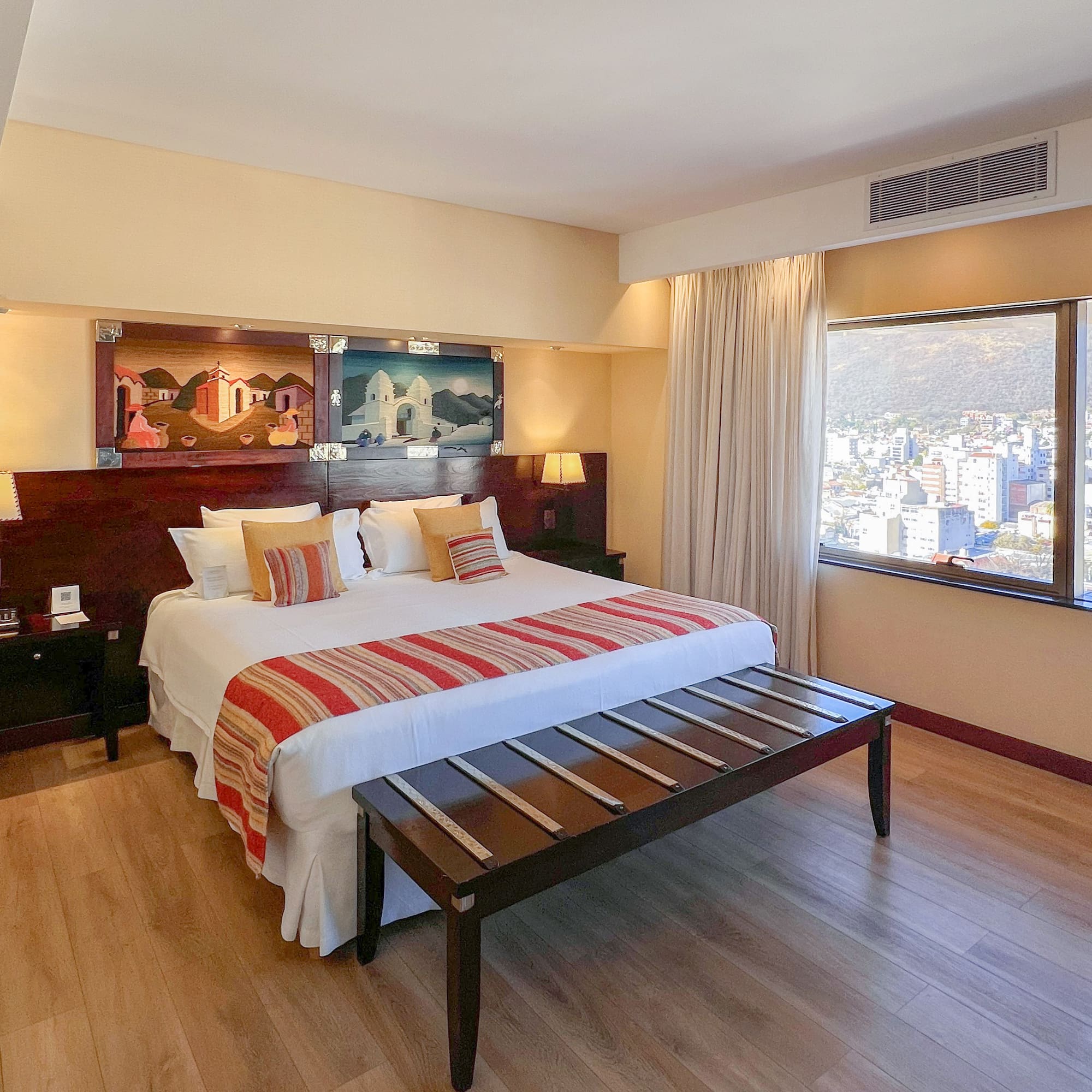 a room with a television and chairs