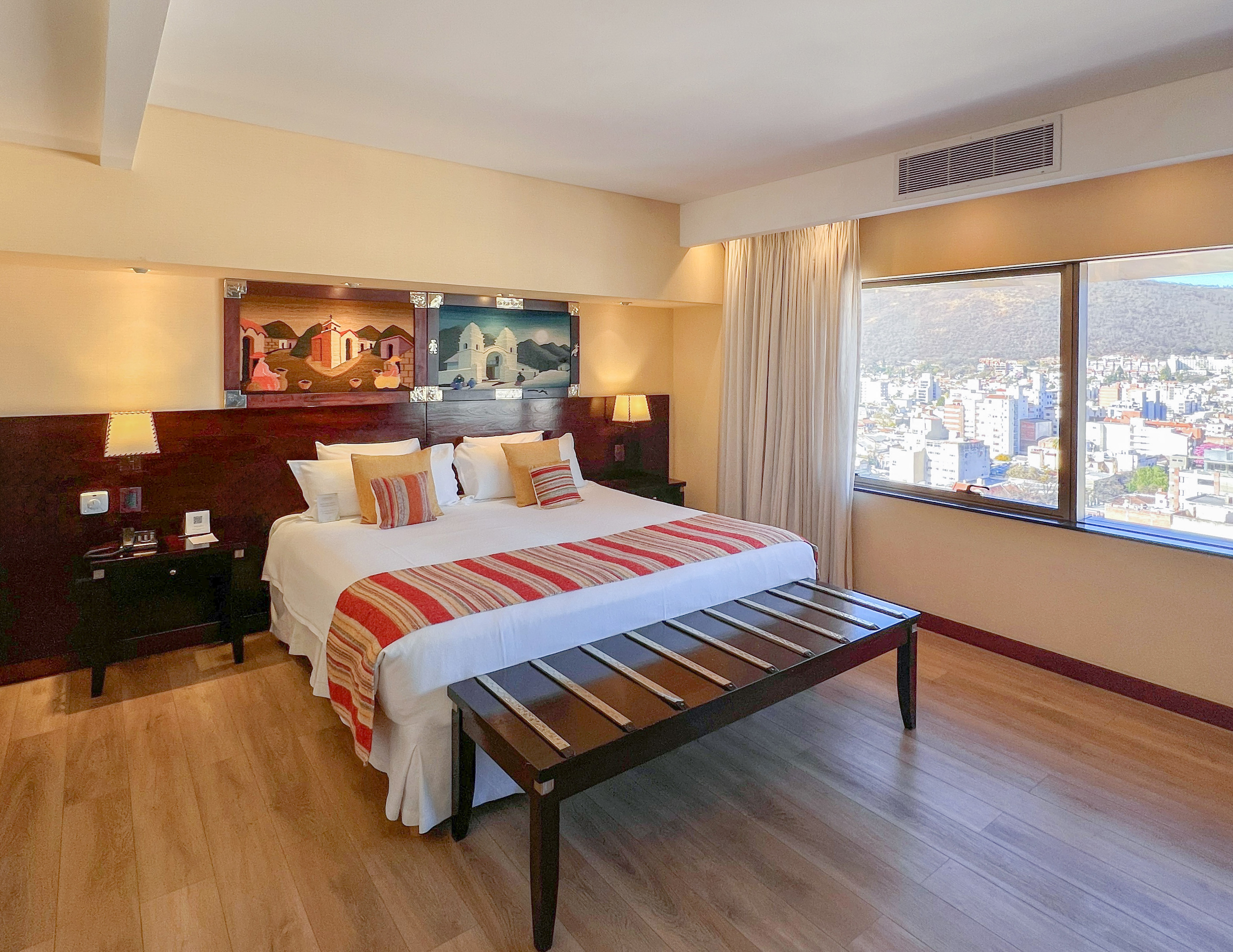 a room with a television and chairs