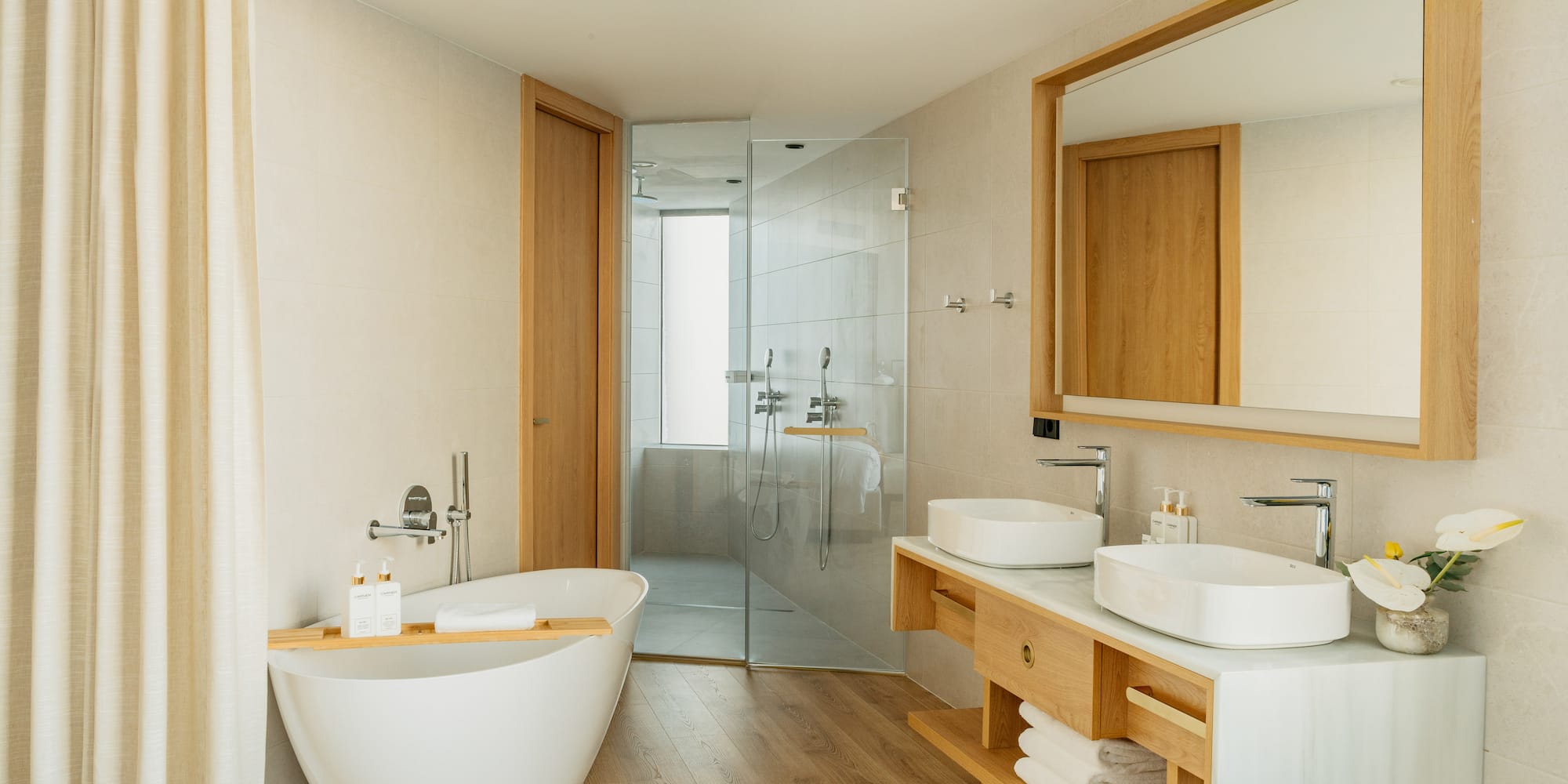a bathroom with a tub and sink