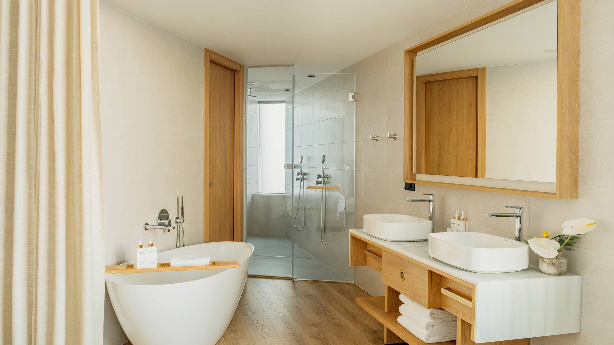 a bathroom with a tub and sink