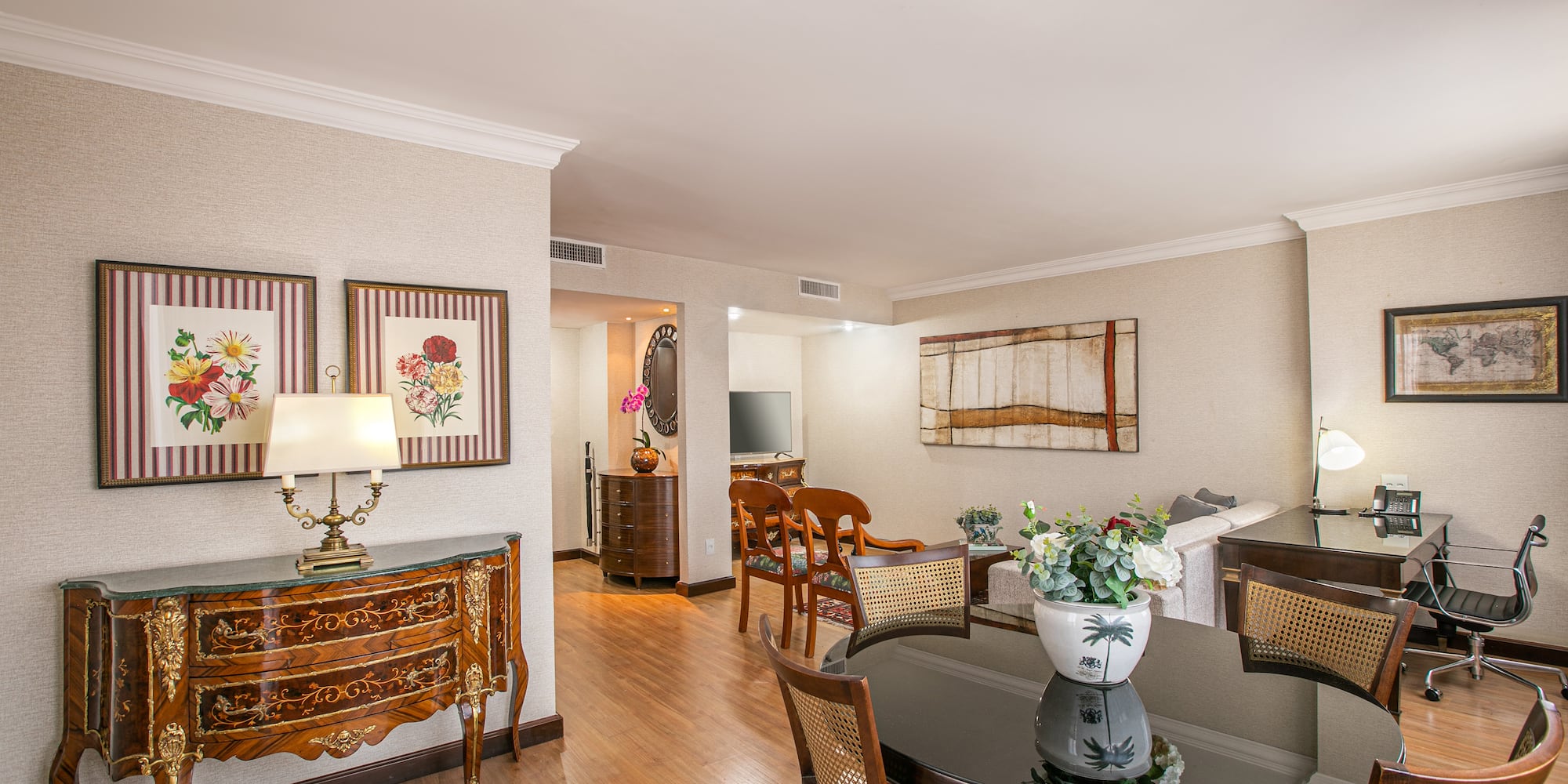 a room with a table and chairs